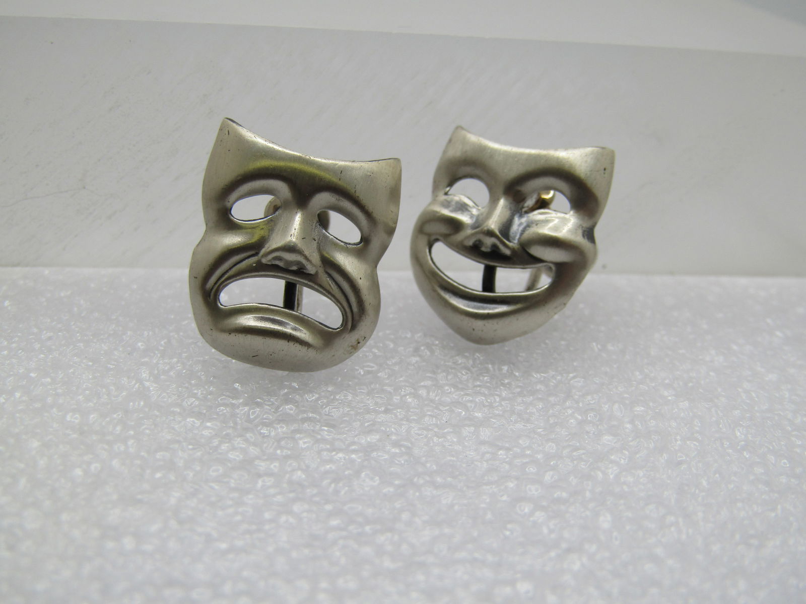 Vintage Comedy Tragedy Earrings, Screwback, Beau Sterling, 1960's: Vintage Comedy Tragedy Earrings, Screwback, Beau Sterling, 1960's. Very clearn and in very good condition. brushed sterling and marked sterling and signed Beau. They also were tested and test as sterl