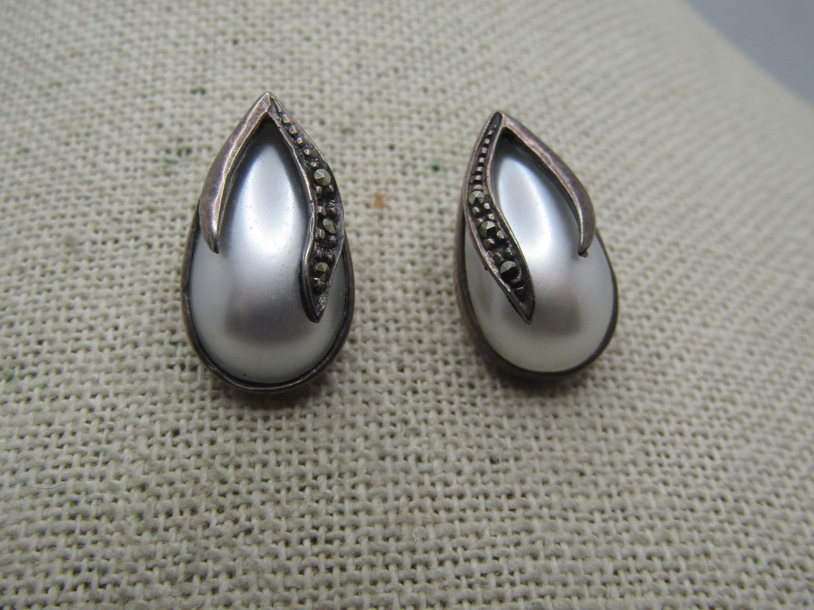Vintage Sterling Marcasite/Faux Pearl Earrings, Pierced, 1980's: Vintage Sterling Marcasite/Faux Pearl Earrings, Pierced, 1980's. These have a bezel-set teardrop shaped pear that is appx. 18mm tall and 10mm wide with two leaf-flike drops cascading down the top of