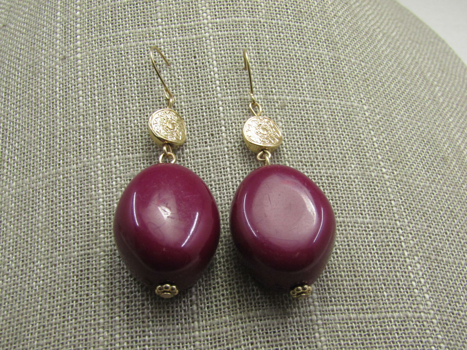 Vintage Erica Lyons Faux Coin Purple Drop Earrings, Pierced, 2.25": Vintage Erica Lyons Faux Coin Purple Drop Earrings, Pierced, 2.25" and 3/4" wide. They have an ap. 3/8" faux coin on top with a larged chunky purple lightweight plstic bead below that is appx. 3/4" wi