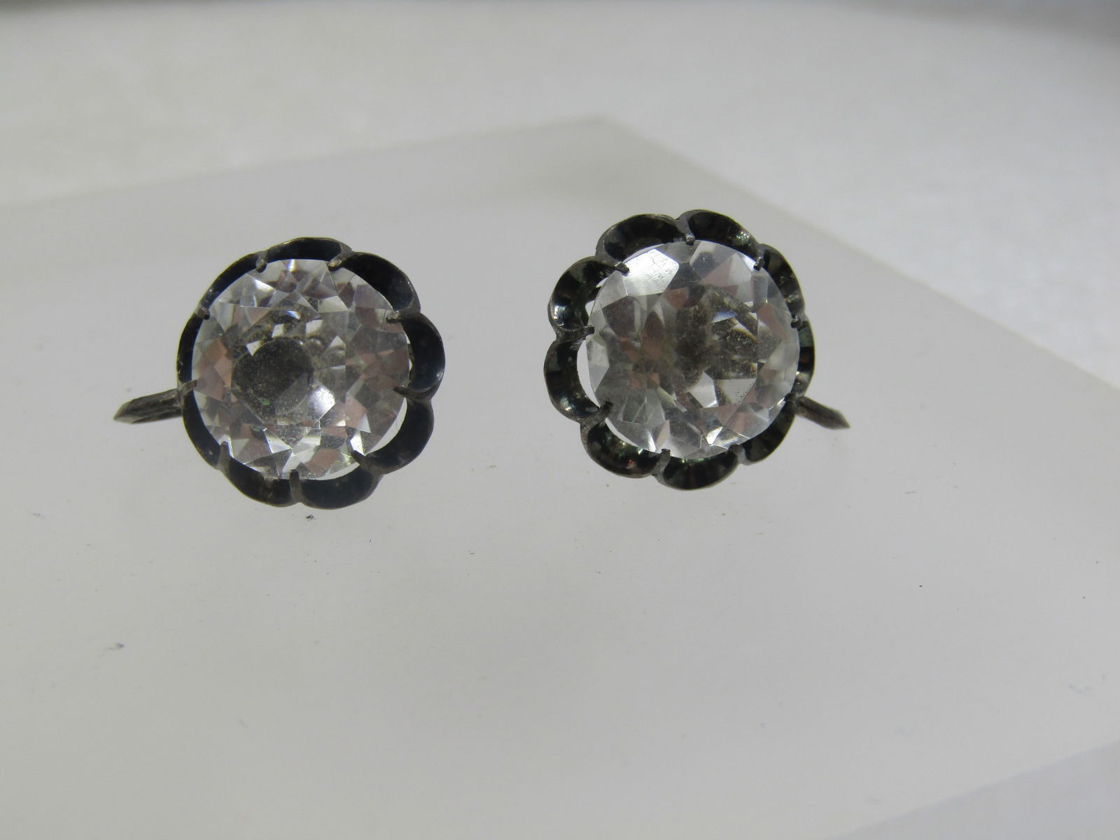 Vintage Silver Clear Quartz Earrings, Screw Back, 1930's-1940's: Vintage Silver Clear Quartz Earrings, Screw Back, 1930's-1940's. These hve a 12mm round nicely cut clear quartz round stone set in a scalloped pront crown-like setting. On the back of the screws one i