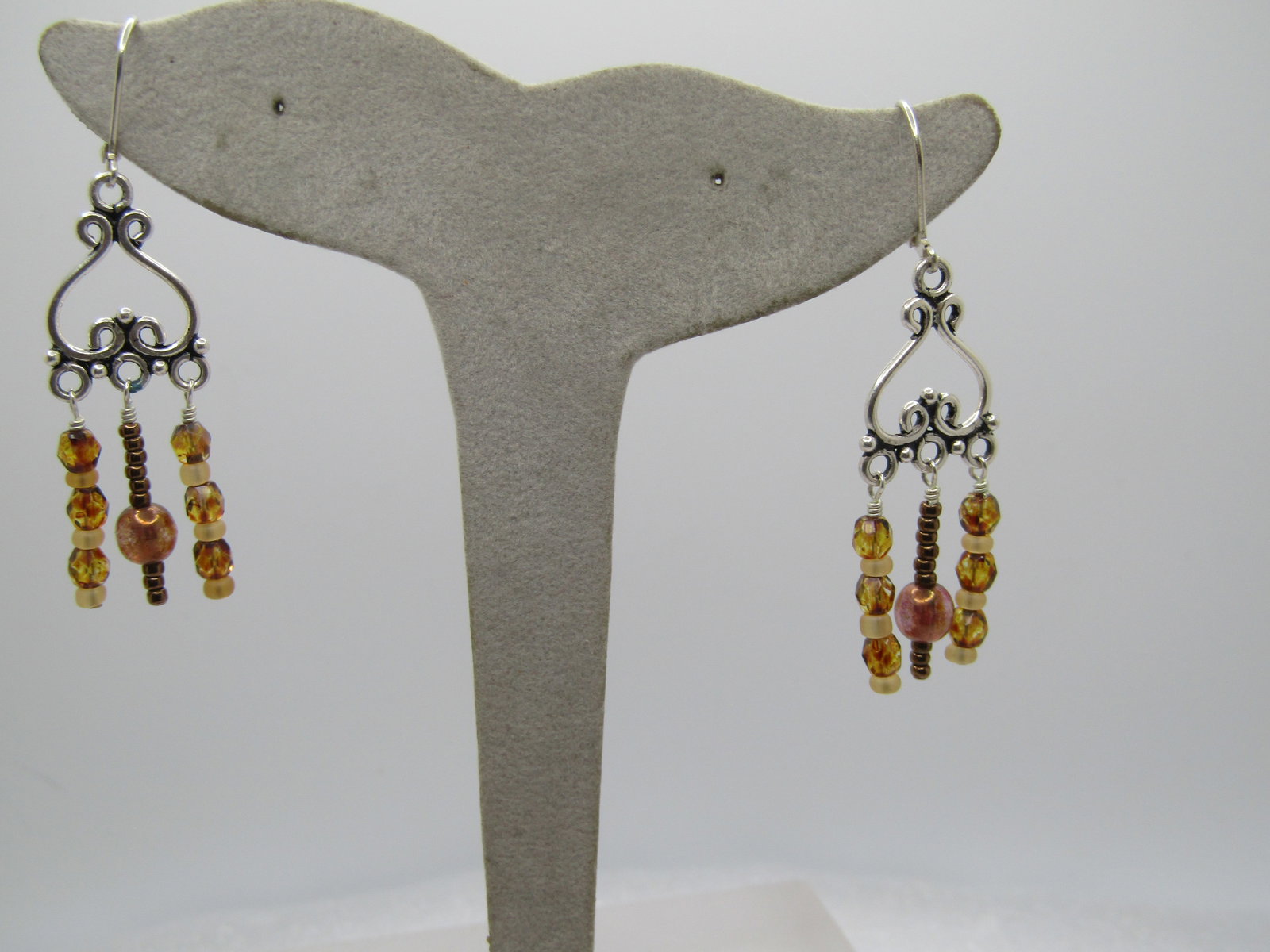 Silver Plated Chandelier Earrings, Leverback. 1990's: Silver Plated Chandelier Earrings, Leverback. 1990's, 2" long and 5/8" wide. The drops test as sterlnig but are not marked and are likely plated. The leverbacks do not test as sterling. They have gold