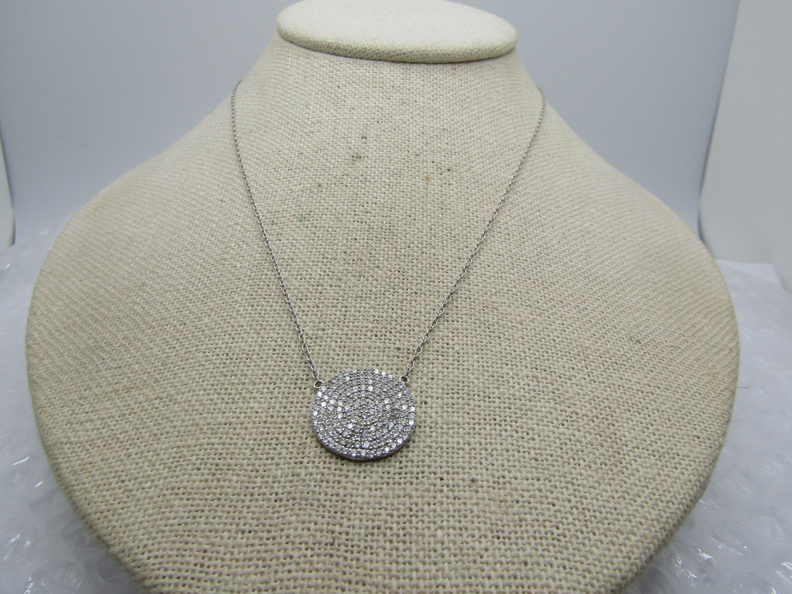 Vintage Sterling Stud Dangle Earring, Pierced, Red Glass Drop, 1980's-1990's: Vintage Sterling Stud Dangle Earring, Pierced, Red Glass Drop, 1980's-1990's. This has a 3/4" round pendant that is flat with micro CZs set throughout the pendant in circular rows. On each top side of