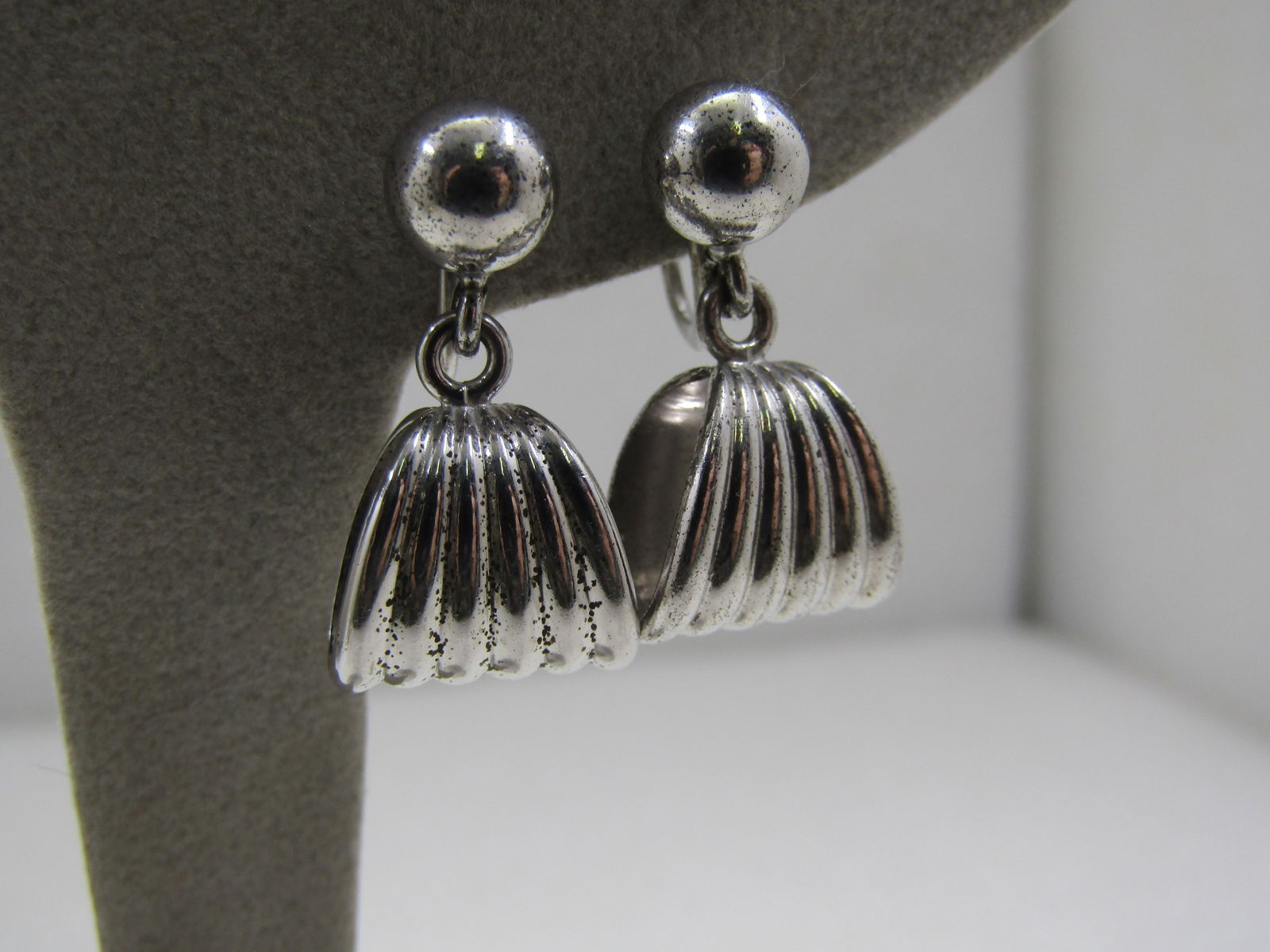 Vintage Sterling Stud & Drop Ridged Hoop Earrings, Screwback: Vintage Sterling Stud & Drop Ridged Hoop Earrings, Screwback. 7mm ball stud from which an elongated ridge hoop drops - taperedhoop that is appx. 1/4" at top and 1/5" at the bottom. Marked sterling on