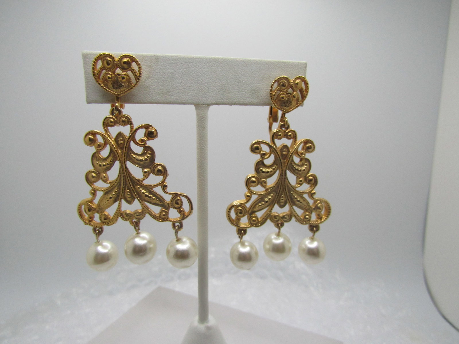 Vintage Filigree Faux Pearl Drop Earrings, Statement, Clip.: Vintage Filigree Faux Pearl Drop Earrings, Heart Stud Statement, Clip. These have a scrolled heart stud that is appx. 1/2" and from there there is a 2" scrolled drop with three 9mm faux pearls danglin
