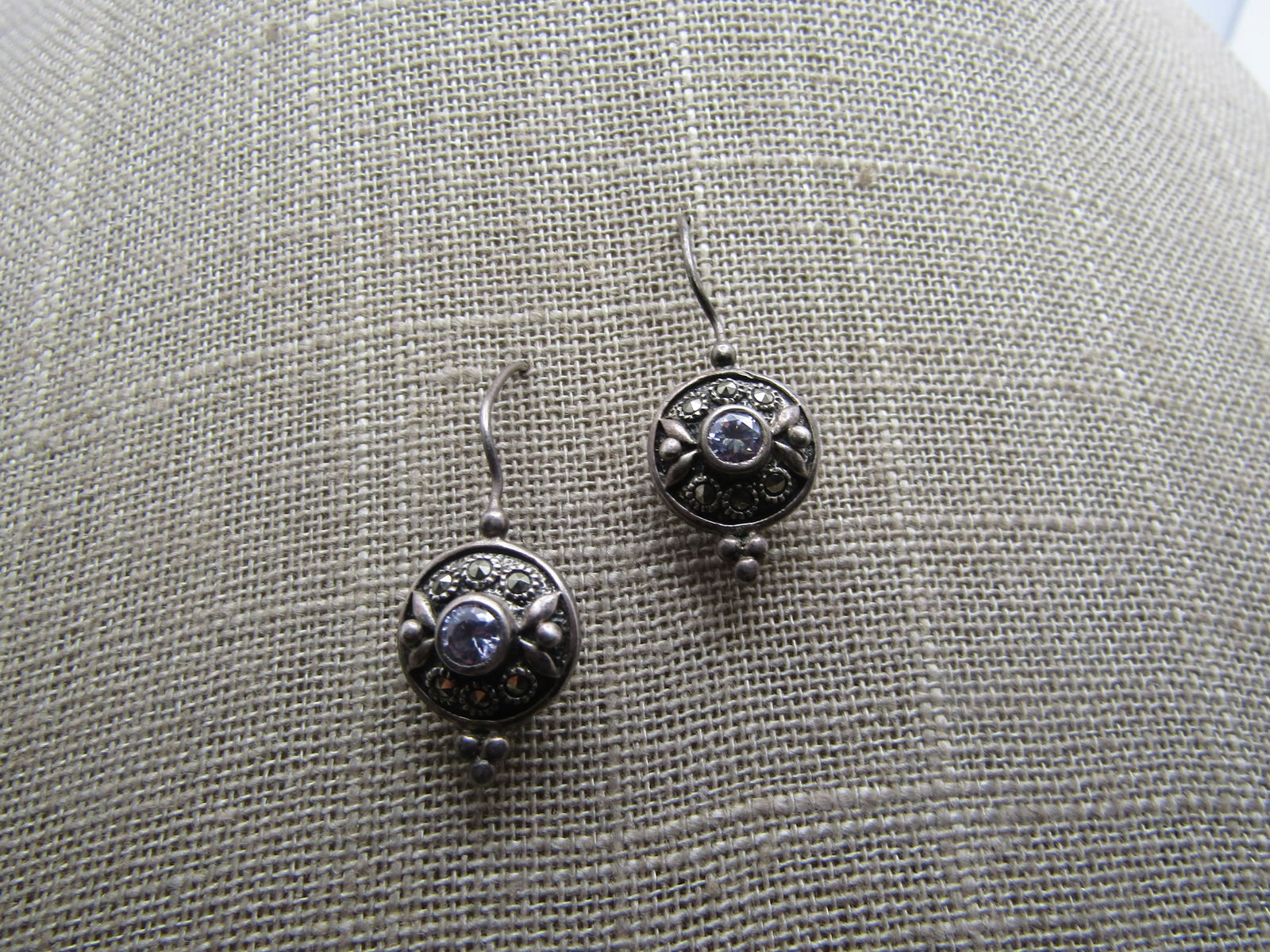 Vintage Sterling Marcasite Clear Stone Earrings, Signed Marsala, 1980's-1990's: Vintage Sterling Marcasite Clear Stone Earrings, Signed Marsala, 1980's-1990's. The bezel-setting with the clear stone is appx. 5mm round. There are six marcasites set around that stone in each wearin