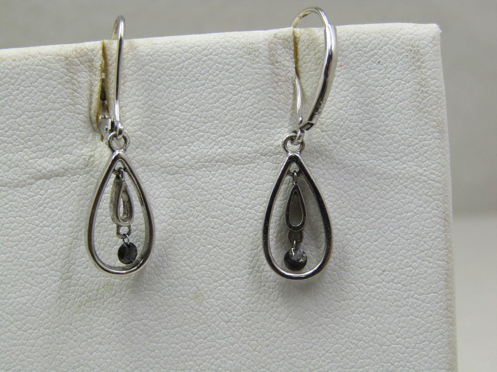 Vintage Stering Hoop with Drop Earrings, Pierced Leverback: Vintage Stering Hoop with Drop Earrings, Pierced Leverback. They have a teardrop hoop and a tear drop open drop in the center with a hematite stone dangling, signed NAJ and marked .925 and tested . We