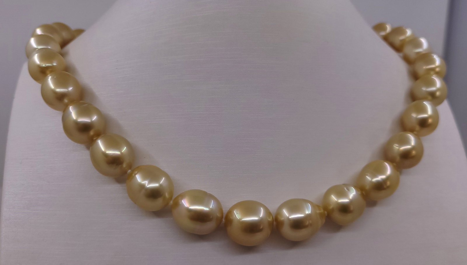 Necklace PSL Certified Deep Golden South Sea Pearls - 10.0x12.5mm: Title: Necklace PSL Certified Deep Golden South Sea Pearls - 10.0x12.5mm Description: This necklace is in the category of the strongest Teri according to the tested results and the P.S.L criteria. 