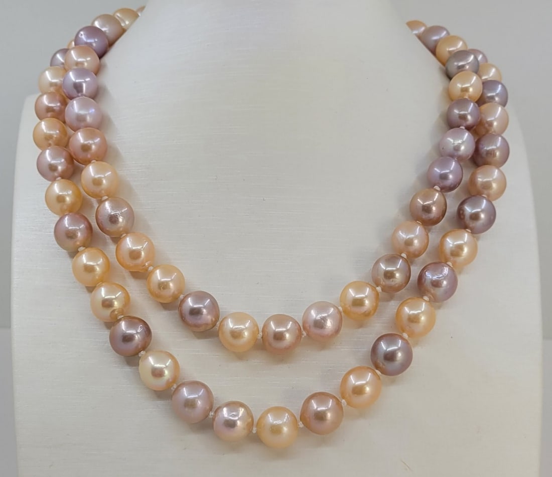 Necklace 10x11mm Multi Edison Freshwater Pearls: Title: Necklace 10x11mm Multi Edison Freshwater Pearls Description: Most freshwater pearls are nucleated by tissue, but Edison cultured pearls are nucleated with beads, exactly as saltwater pearls Thi