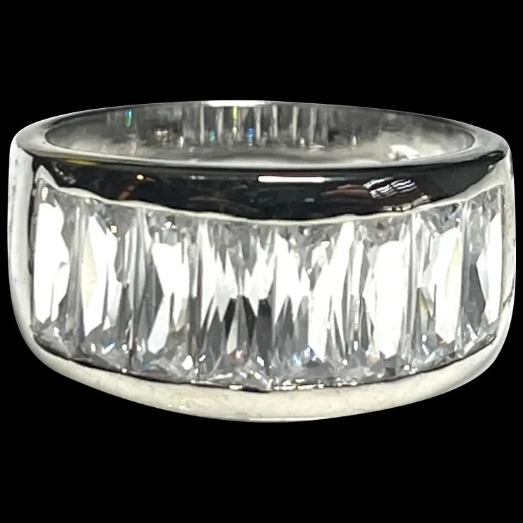 Estate Baguette CZ Half Band Statement Ring: Title: Estate Baguette CZ Half Band Statement Ring Description: Estate Baguette CZ Half Band Statement RingHallmarked: 925 RPWeighs: 7 gramsMeasures US Ring Size: 8.75 Reserve: $35.00 