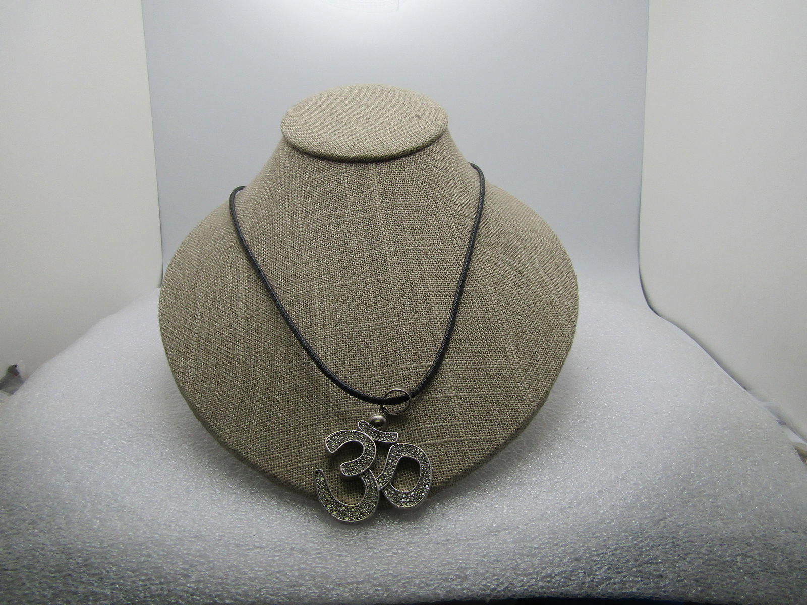 Vintage Sterling Hindu OM CZ Necklace, 24"-26", 1990's-2000's: Vintage Sterling Hindu OM CZ Necklace, 24"-26", 1990's-2000's. The pendant has a large swing bail that is papx. 8mm by 7mm. The pendant is papx. 1.75" long from the bail to the bottom and 1-3/8"