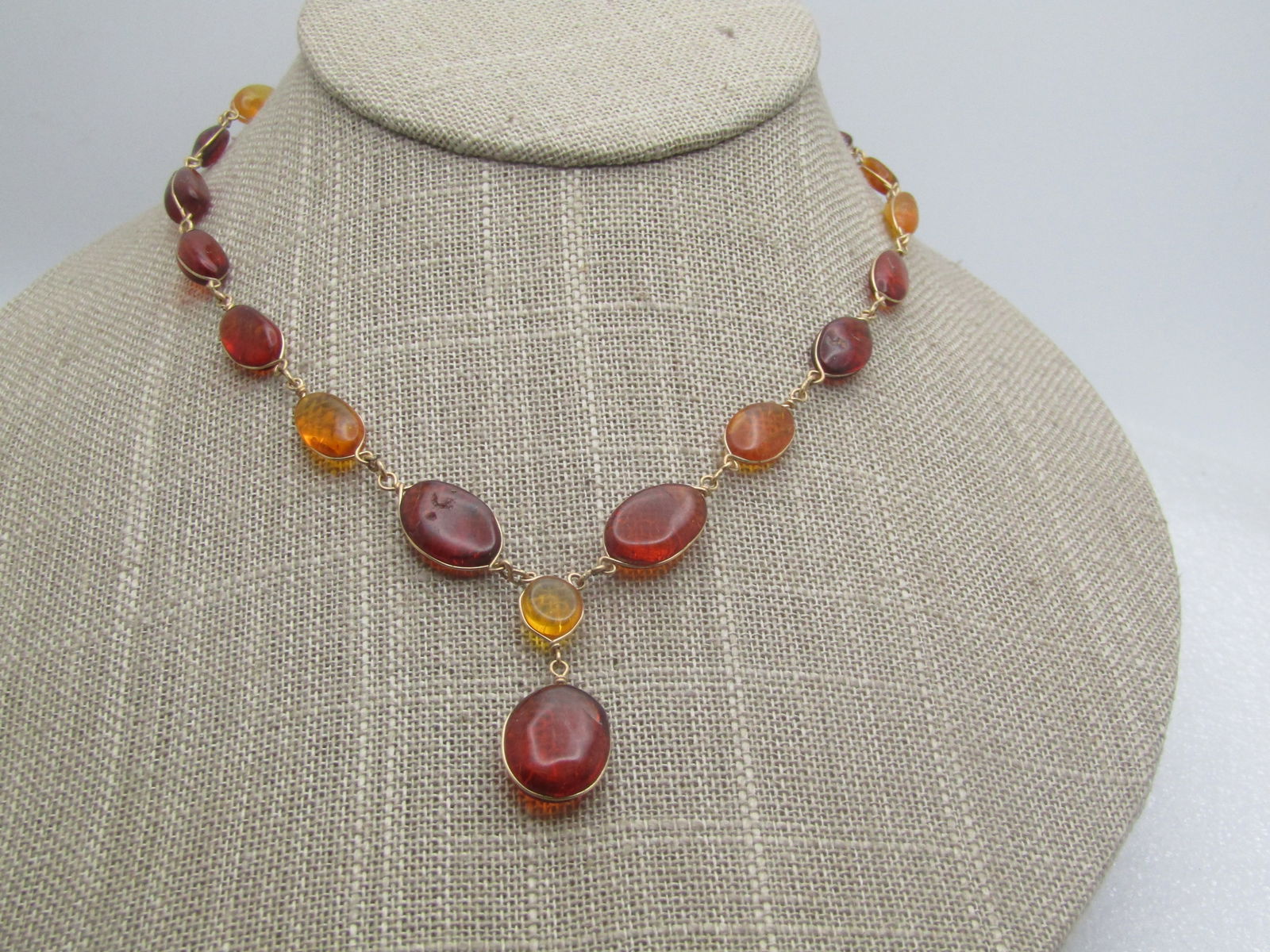 Vintage Graduated Baltic Amber Drop Necklace, 20", Honey & Cognac Amber: Vintage Graduated Amber Drop Necklace, 20", Honey & Cognac Amber mixed throughout in different shaped and size nuggets - all wrapped in a 10kt G.F. wire chain - likely hand made with hook clasp. Some