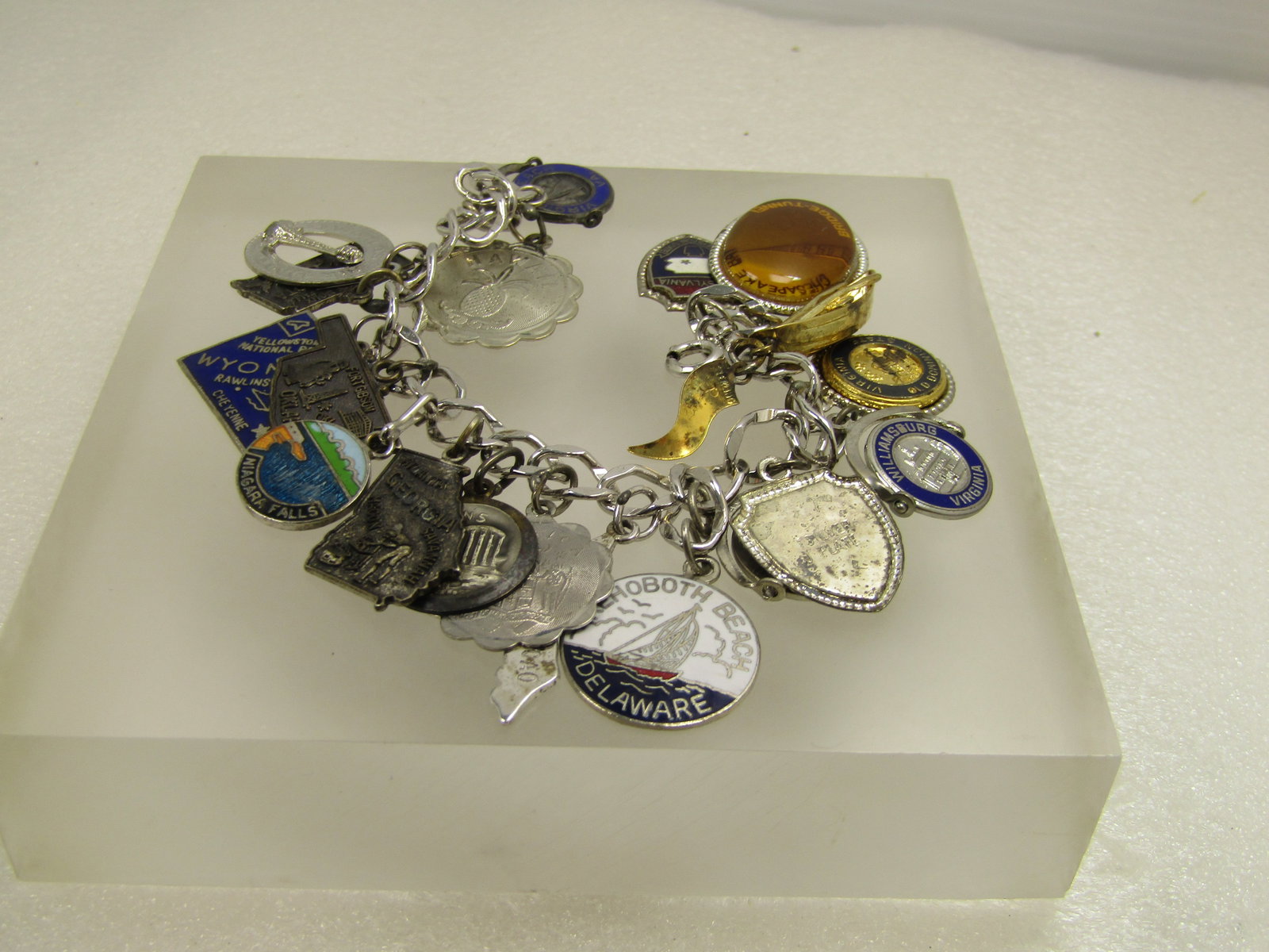 Vintage Sterling Charm Bracelet, 7.5" , 19 Charms, 1950's-1970's: Vintage Sterling Charm Bracelet, 7.5" , 19 Charms, 1950's-1980's. Some of the charms are sterling and some are not. 12 Charms are sterling 7 are not. These are travel charms or travel related - gold f