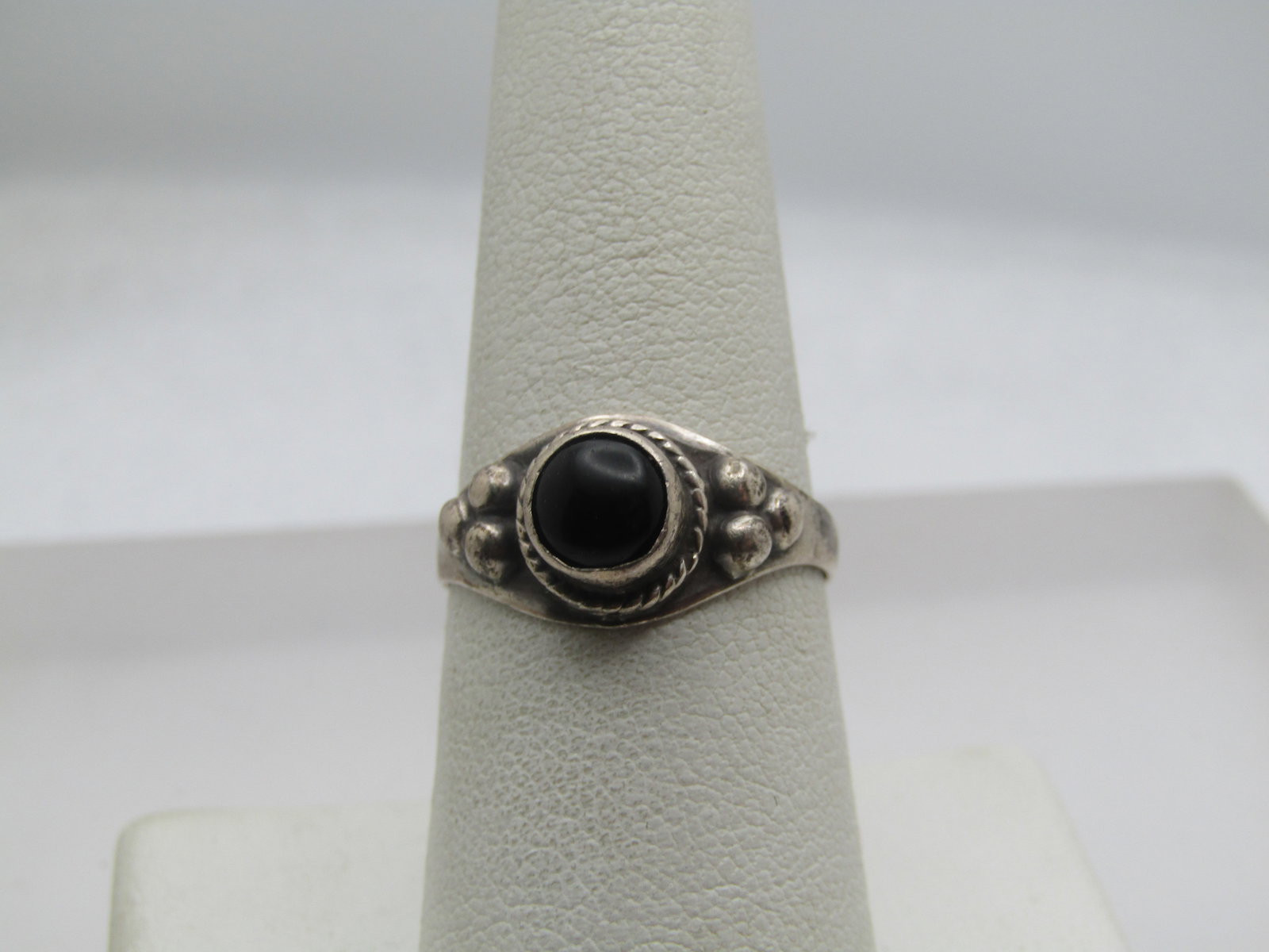 Vintage Sterling Onyx Ring, Southwestern/Bali, Sz. 8, 1970's-1980's: Vintage Sterling Onyx Ring, Southwestern/Bali, Sz. 8, 1970's-1980. The onyx is appx. 6.5mm round with a bezel-setting and sits higher up on the ring, rope accent with triple beaded accent on each