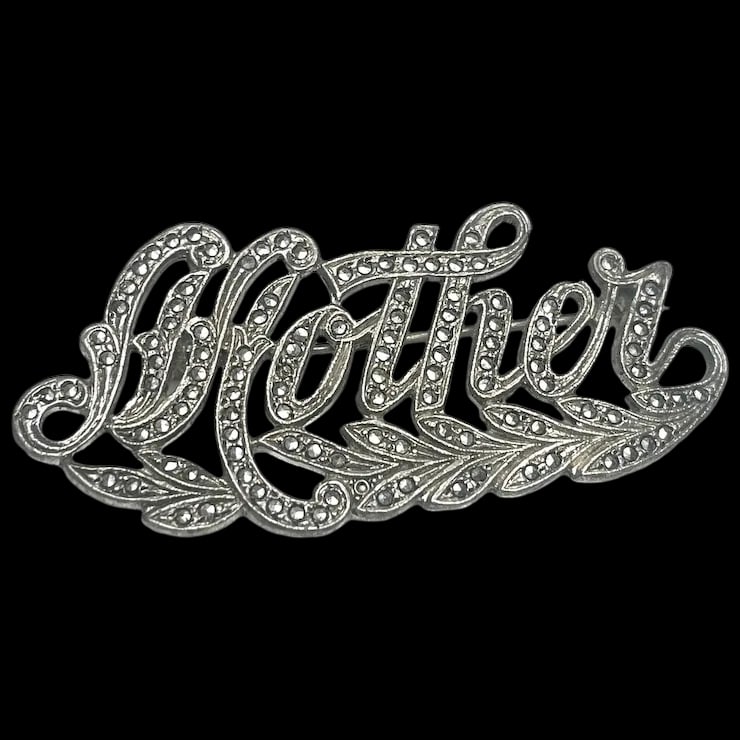 Vintage Mother Brooch in Sterling Silver with Marcasite: Title: Vintage Mother Brooch in Sterling Silver with Marcasite Description: Vintage Mother Brooch in Sterling Silver with Marcasite Hallmarked: SterlingWeighs 14.8 gramsMeasures Approx. 2.75 x 1.25 in