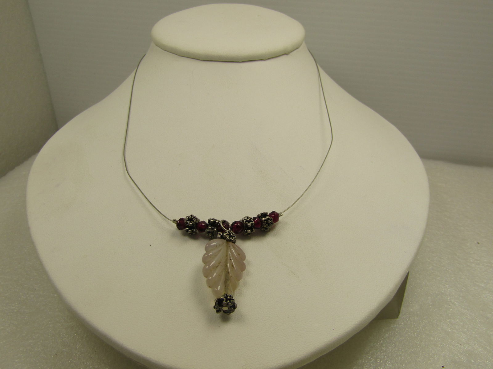Pink Quartz & Garnet Necklace, Leaf Drop, 16", 1990's: Pink Quartz & Garnet Necklace, Leaf Drop, 16", 1990's. This has floral round silver tone beads between the six garnet beads that are an irregular shape and appx. 3mm to 4mm. Droping down from the