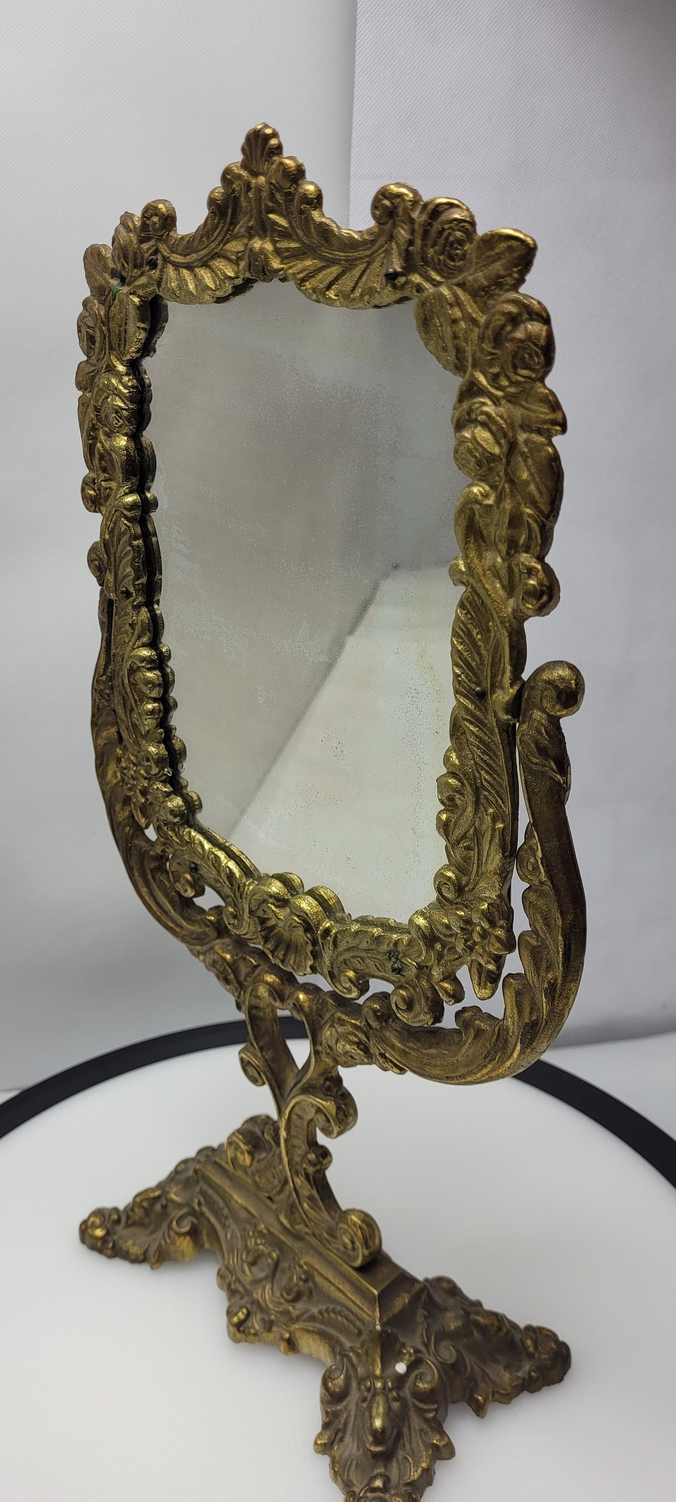 Vintage Brass Mirror Vanity Make Up Flip Antique Cast Metal Ornate Design Neoclassical Gold: Title: Vintage Brass Mirror Vanity Make Up Flip Antique Cast Metal Ornate Design Neoclassical Gold Description: Vintage Cast metal Antique Vanity Mirror. In good condition with minor wear and scratche