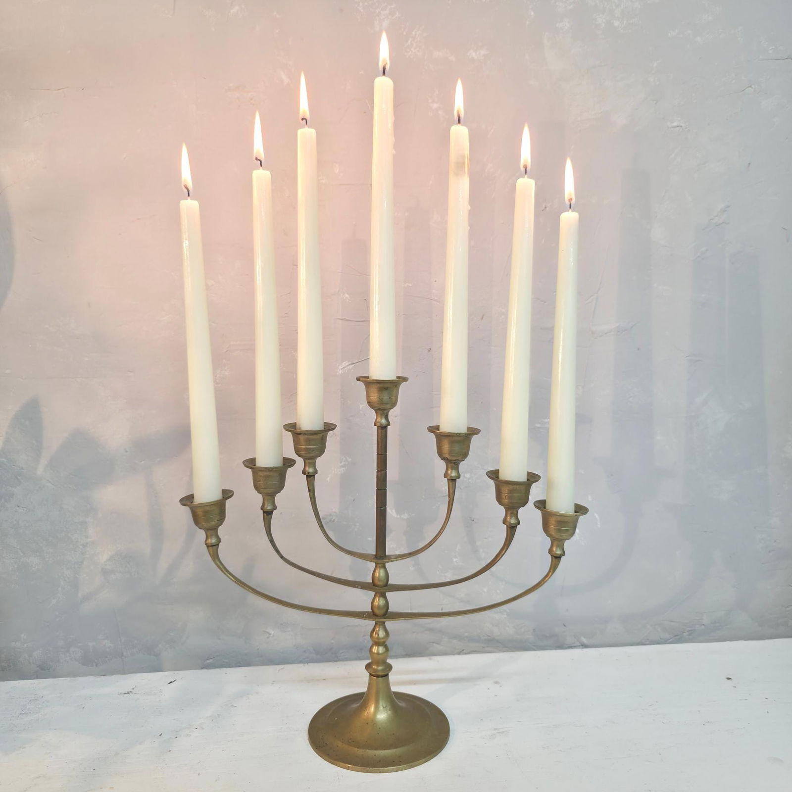 Vintage Brass Candelabra Grandmillennial Candle Holder7-Arm Taper Hollywood Regency Holiday: Title: Vintage Brass Candelabra Grandmillennial Candle Holder7-Arm Taper Hollywood Regency Holiday Centerpiece Decor Description: The graceful symmetry, sculpted base, and soft golden patina give it a