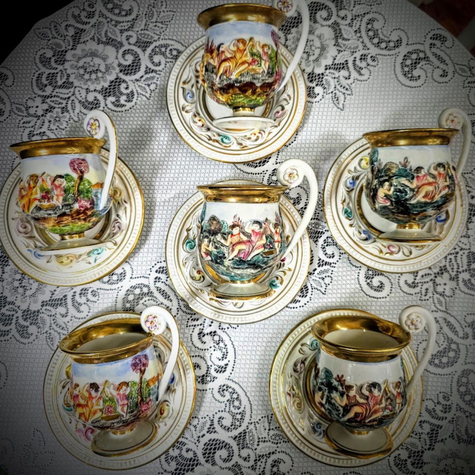 Vintage Capodimonte Tea Set Italian Porcelain Rococo Gilded Cups Saucers Gold Rim Mid-20th Century: Title: Vintage Capodimonte Tea Set Italian Porcelain Rococo Gilded Cups Saucers Gold Rim Mid-20th Century Old World Luxury Description: Vintage Capodimonte Tea Set Hand-painted and gilded with raised
