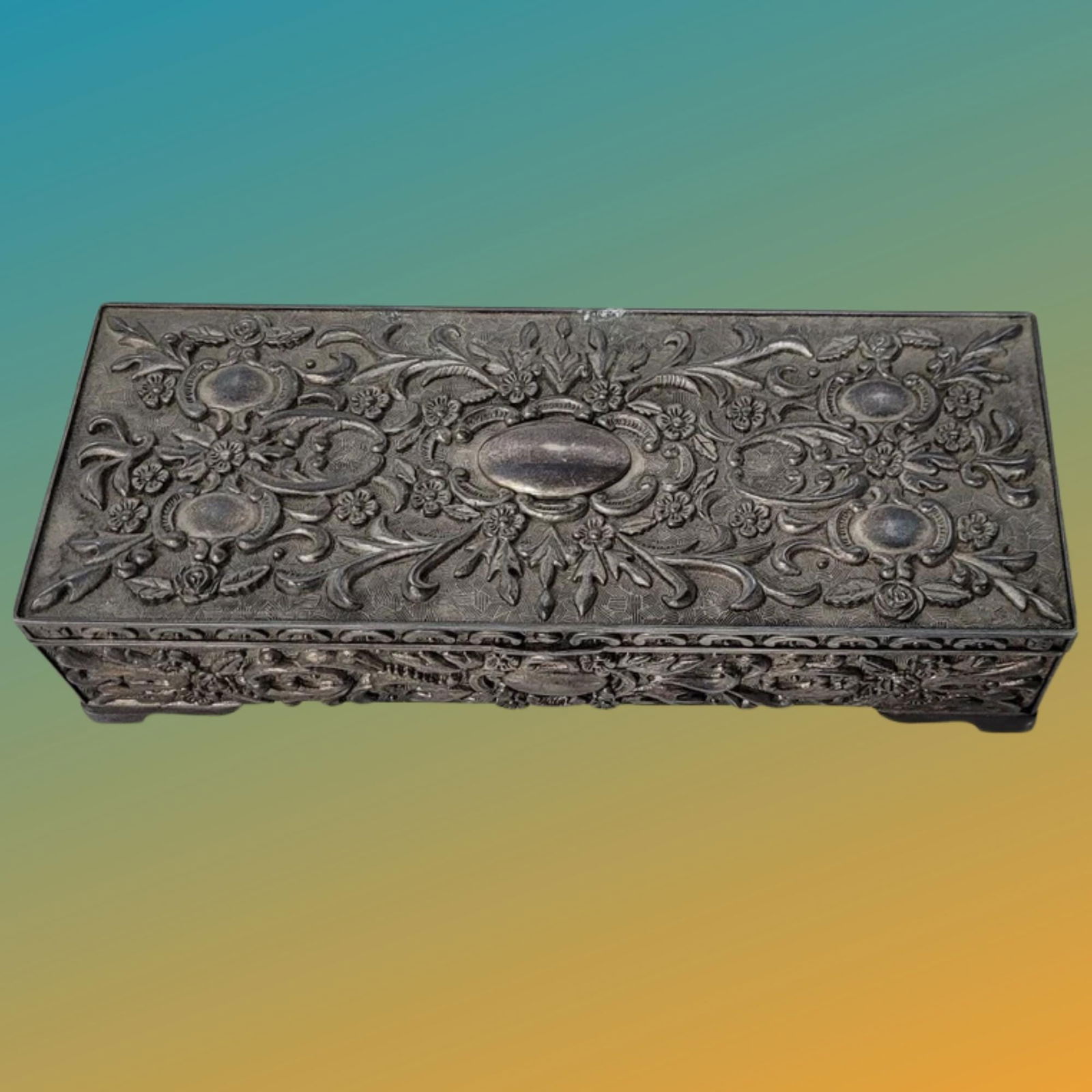 Vintage Victorian silver repousse jewelry box coffin style ornate red velvet lined case: Title: Vintage Victorian silver repousse jewelry box coffin style ornate red velvet lined case Description: Finely Crafted 19th century Victorian silver repousse Vintage Jewelry Box Coffin Style