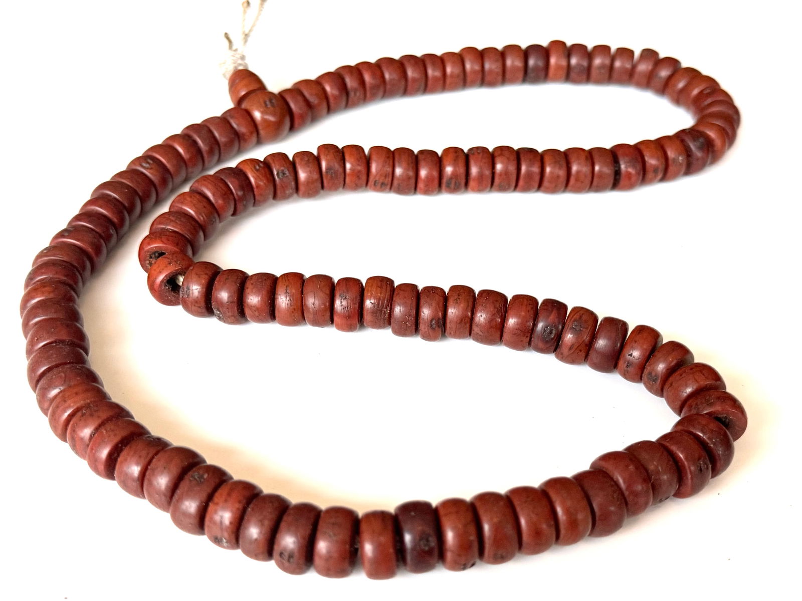Headhunters warrior necklace - Naga - India: Title: Headhunters warrior necklace - Naga - India Description: Authentic Naga Head Hunter Warrior's Ceremonial Necklace. Hand carved brown color Beads. All Strung on the Original Hand Woven Fiber
