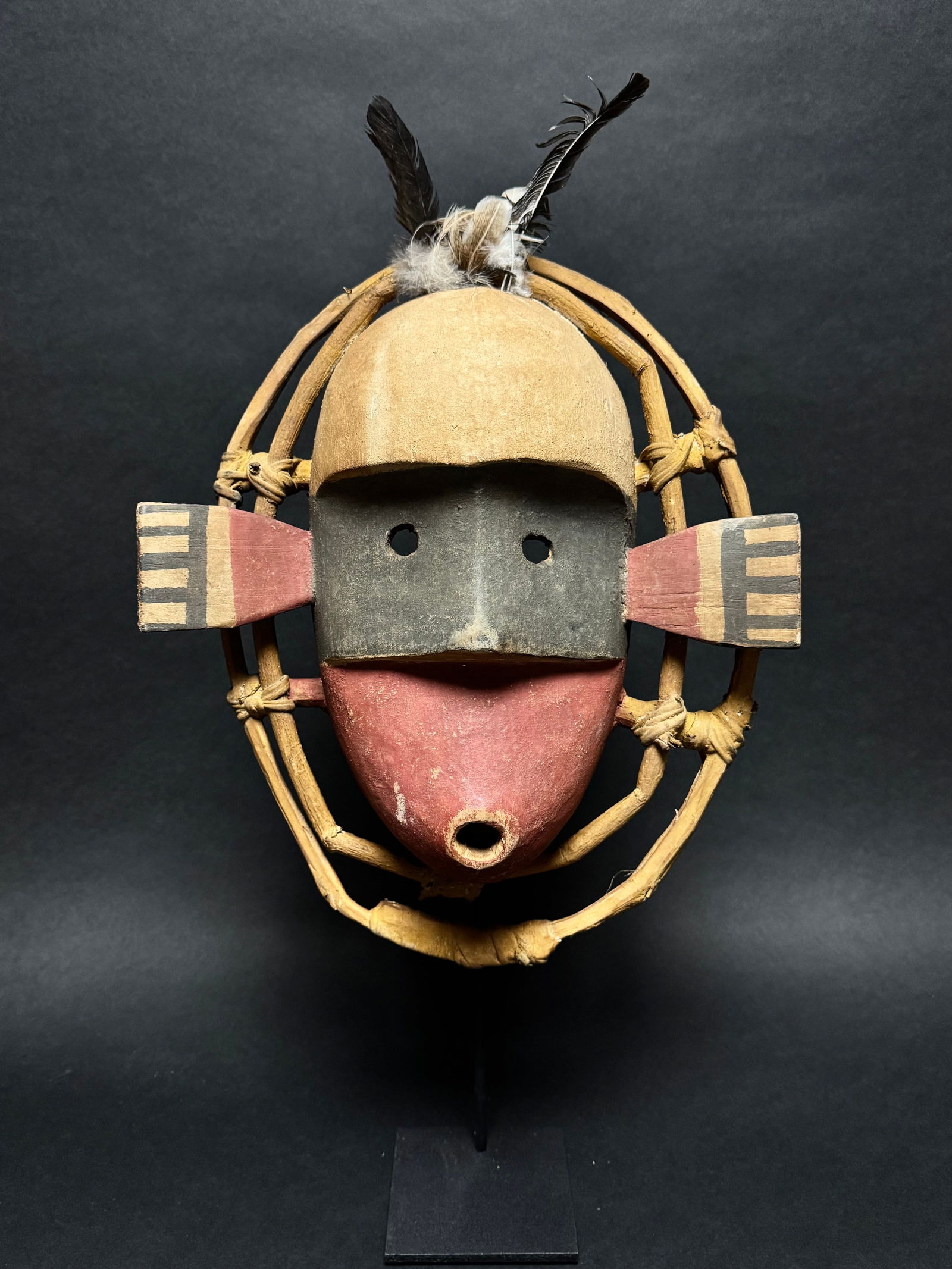 Yupik Mask with feathers made by the Inuit People who live on the West Coast of Alaska. (1 of 12)