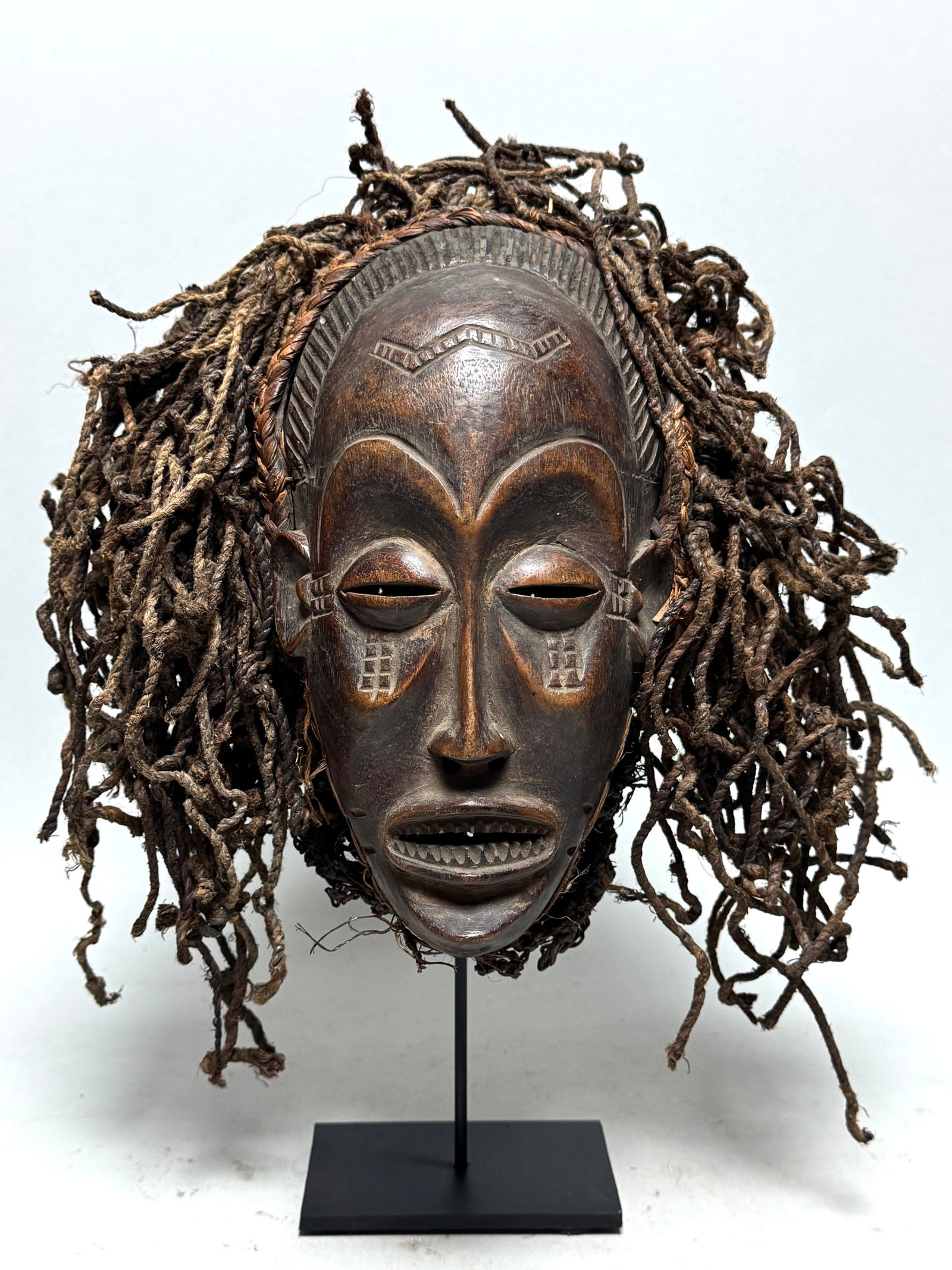 Mwana Pwo mask - Chokwe - Angola: Title: Mwana Pwo mask - Chokwe - Angola Description: This mask is from the Chokwe people in central Angola, parts of the Democratic Republic of Congo and Zambia. These masks were used during Munkanda
