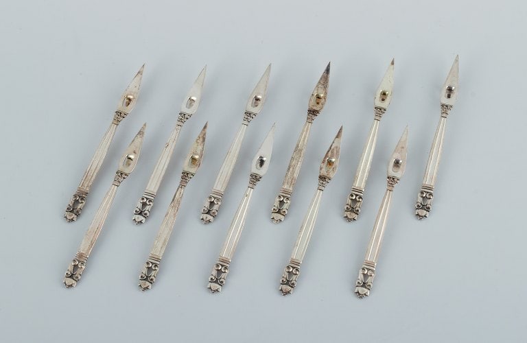 Georg Jensen, a set of eleven rare Acorn cocktail picks.: Title:Georg Jensen, a set of eleven rare Acorn cocktail picks.Description:Georg Jensen, a set of eleven rare Acorn cocktail picks. Sterling silver. Marked. Mid 20th century. In excellent condition.