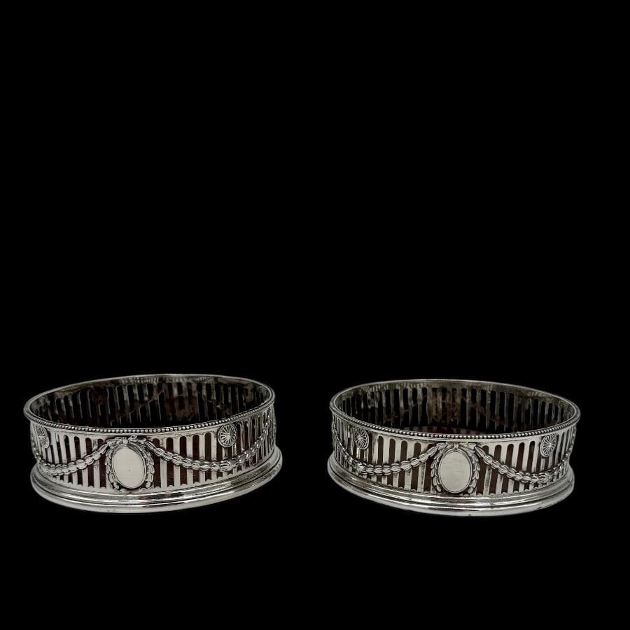 18th Century Antique George III Silver Pair Wine Coasters London 1776 Robert Hennell: Title:18th Century Antique George III Silver Pair Wine Coasters London 1776 Robert HennellDescription:Description Truly fine pair of Georgian silver pierced coasters decorated with supremely stylish