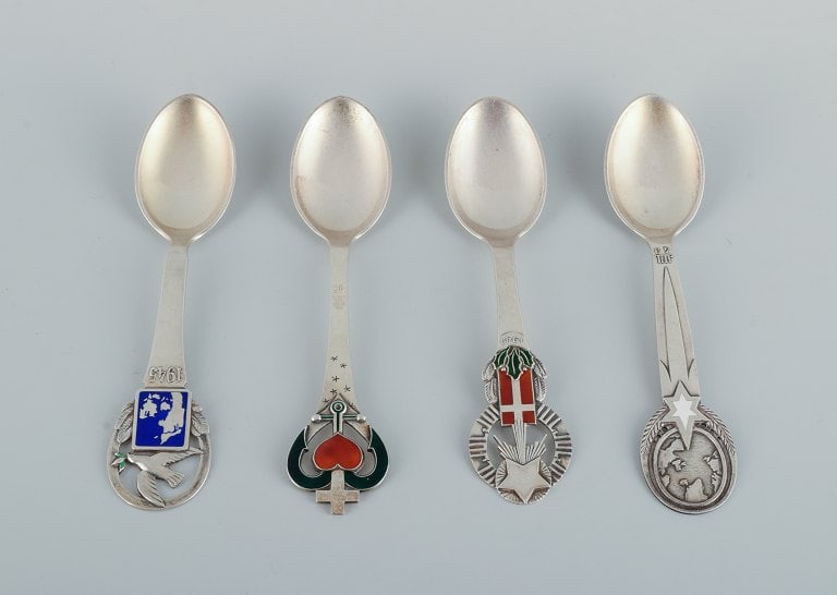 Four Christmas spoons from 1941, 1945, 1947 and 1949.: Title:Four Christmas spoons from 1941, 1945, 1947 and 1949.Description:Four Christmas spoons from 1941, 1945, 1947 and 1949. Manufactured by Grann and Laglye, Copenhagen. In excellent condition.