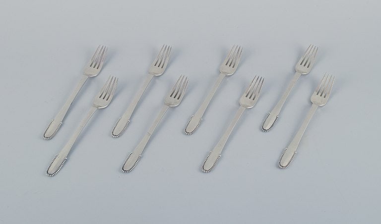 Georg Jensen Beaded. A set of eight lunch forks in 830 silver and sterling silver. (1 of 6)
