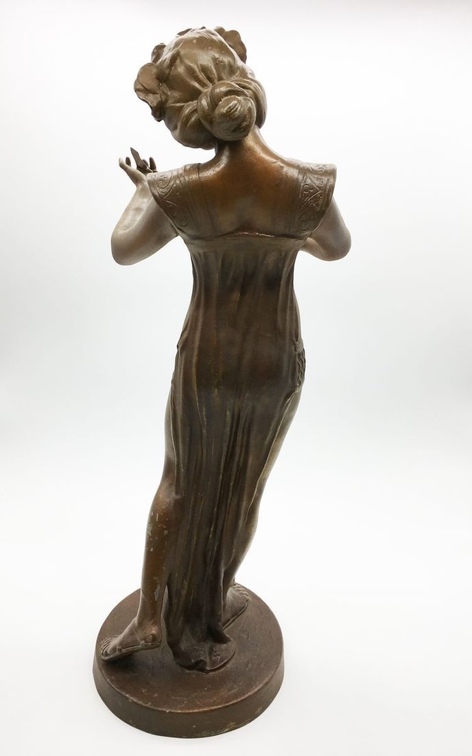 Statue of young beautiful woman - 4