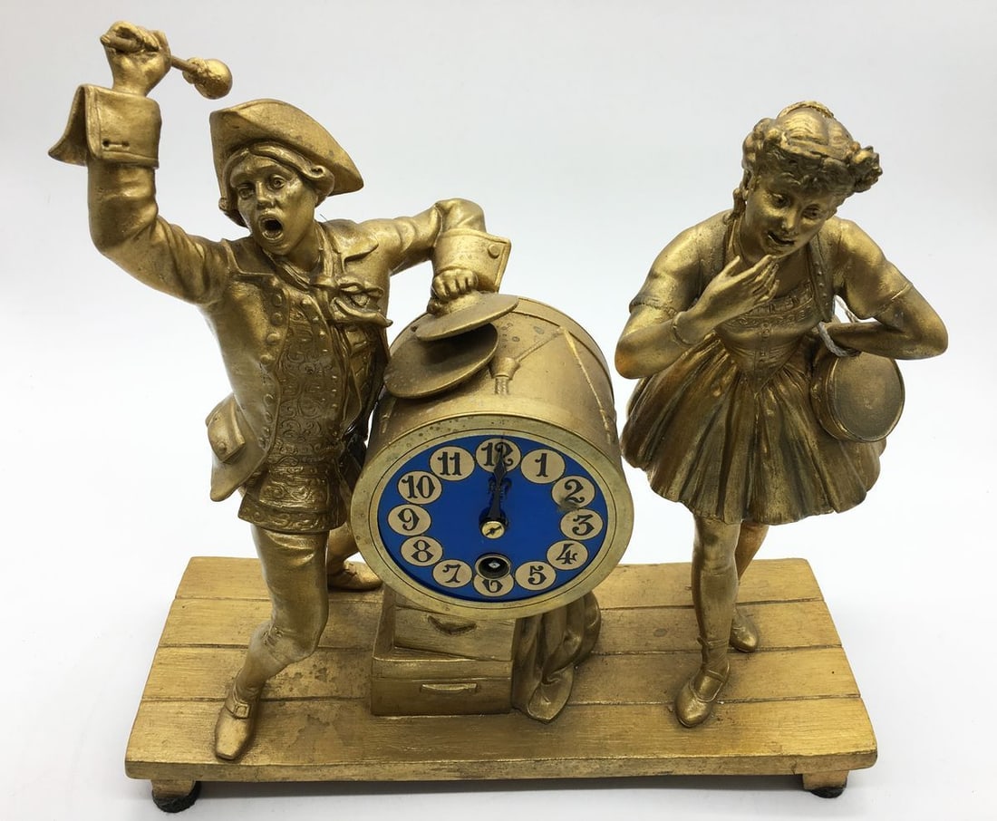 Bronze statue with a clock - 2