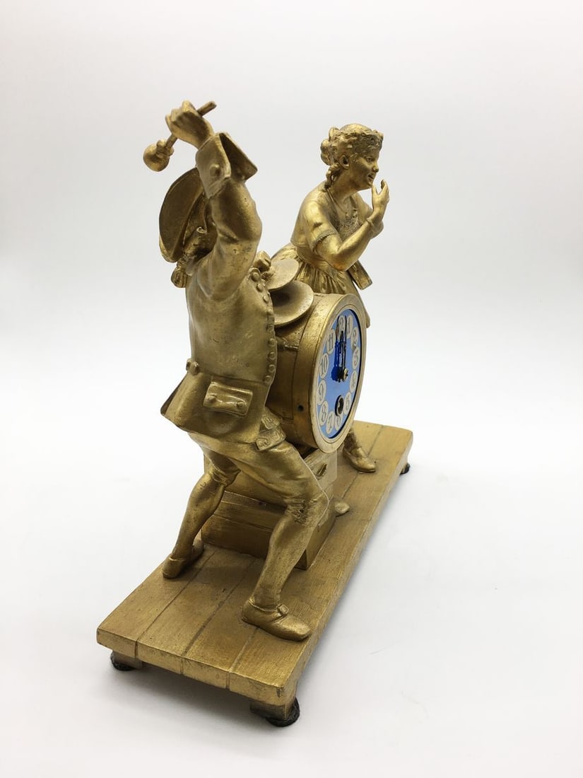 Bronze statue with a clock - 3