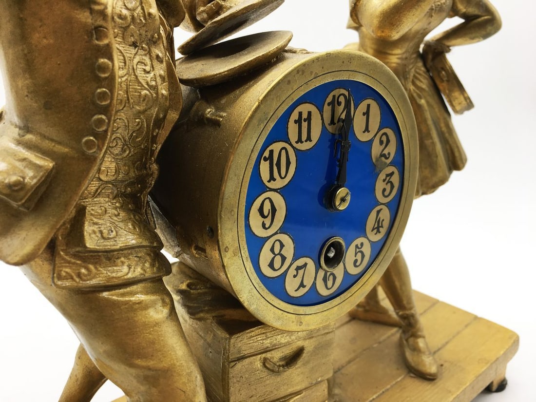 Bronze statue with a clock - 5