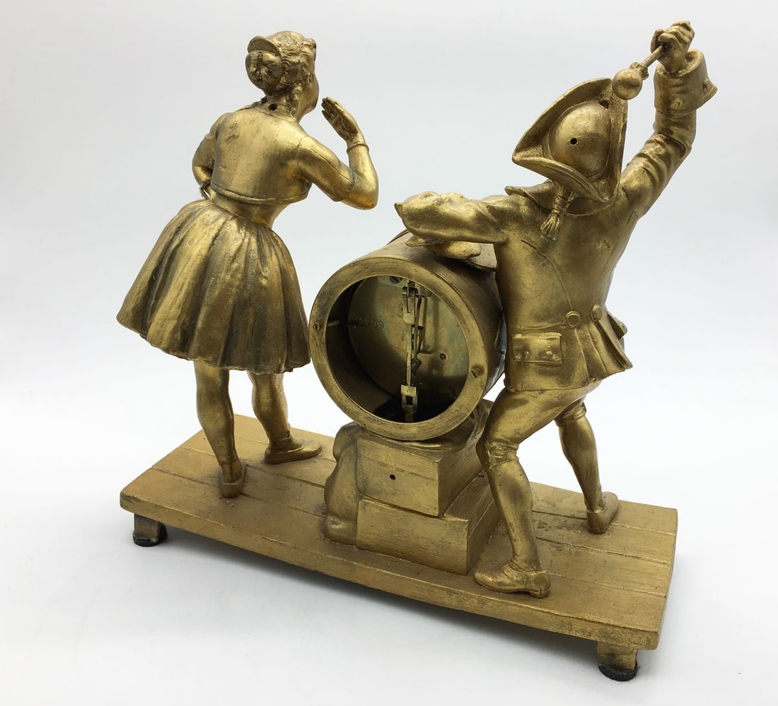 Bronze statue with a clock - 6