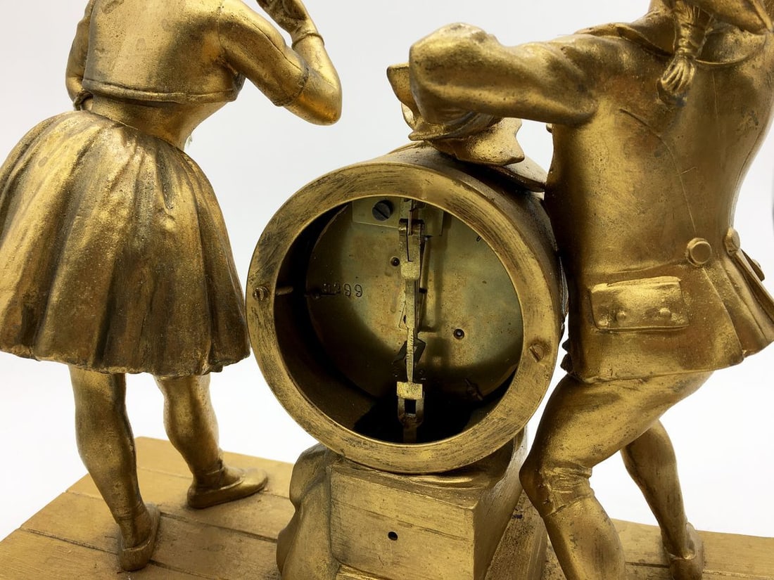 Bronze statue with a clock - 7