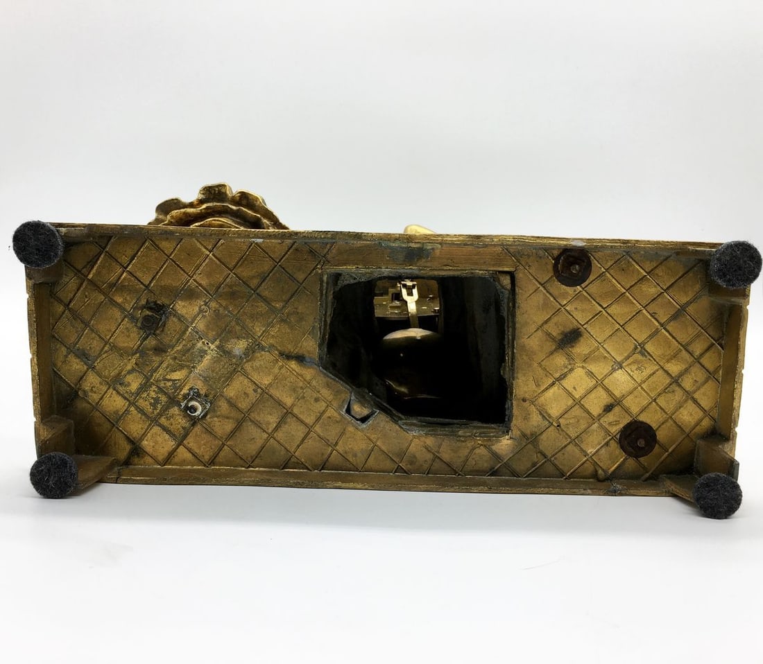 Bronze statue with a clock - 8