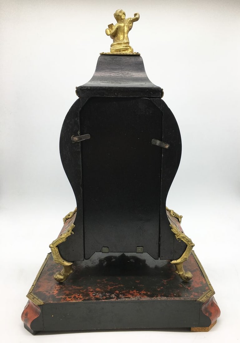 Bronze watch with a figure - 11