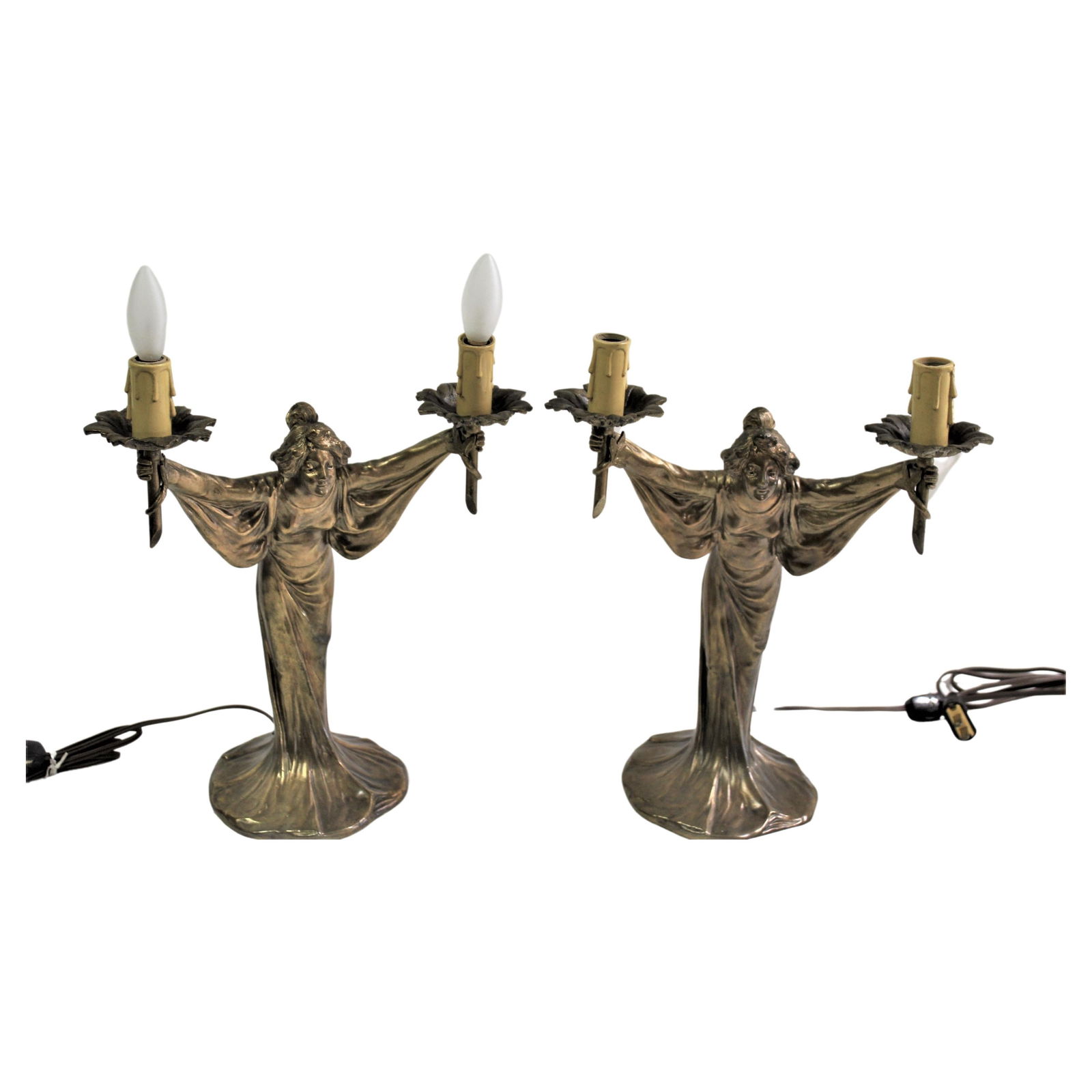 Art Nouveau Lady Candelabras Antique: A classic pair of Art Nouveau Lady's holding up two lights. Look great together lit up. These are Antique and the wires are new. They have that Golden finish. They will have to be packed really well t