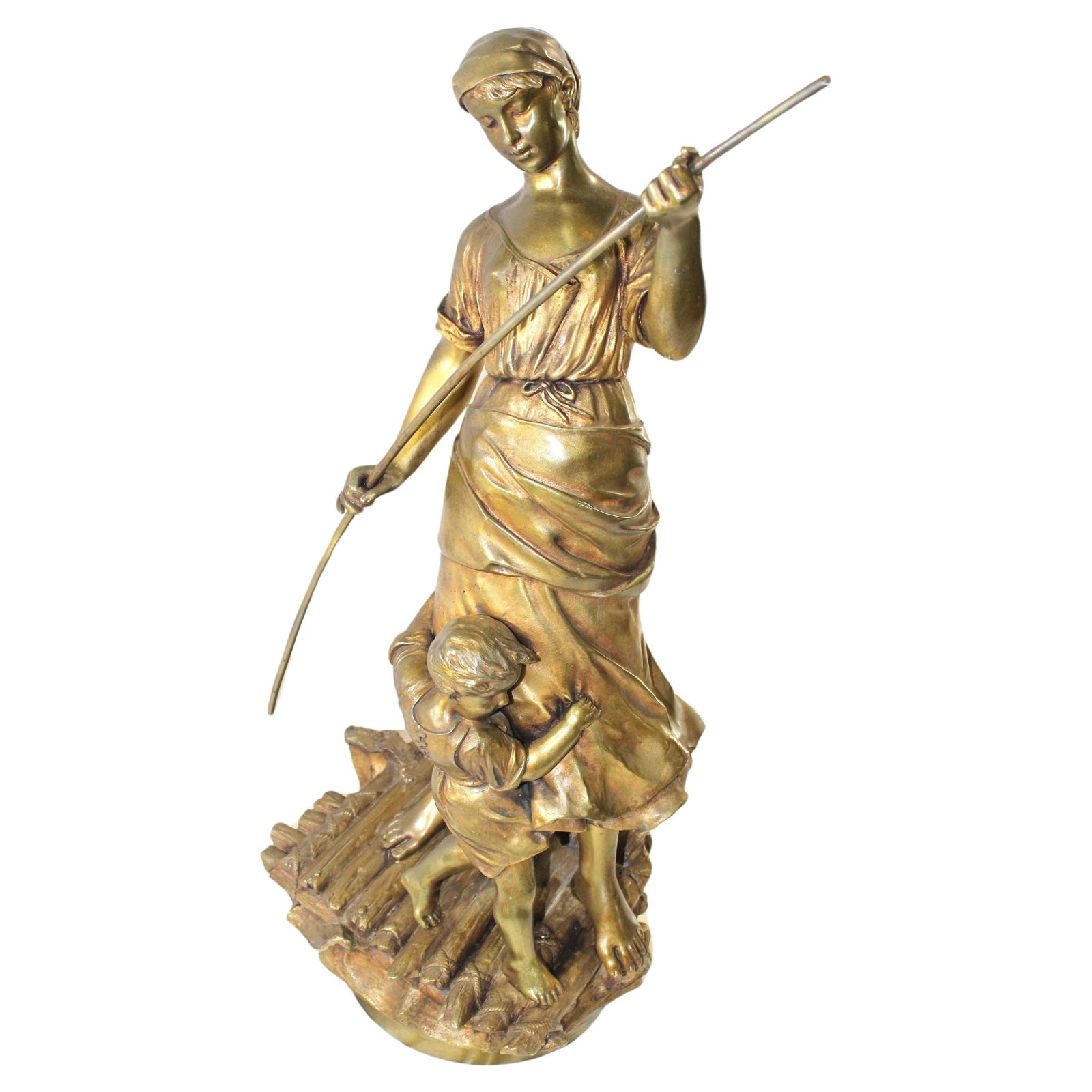 Original Art Nouveau Bronze of a Mother and Child on a Raft Signed: A very fine casting with lots of details showing the little boy's fear of falling off . Holding tight to his mothers dress . Looks like it was gold gilded . Has the Artist signature on the round part