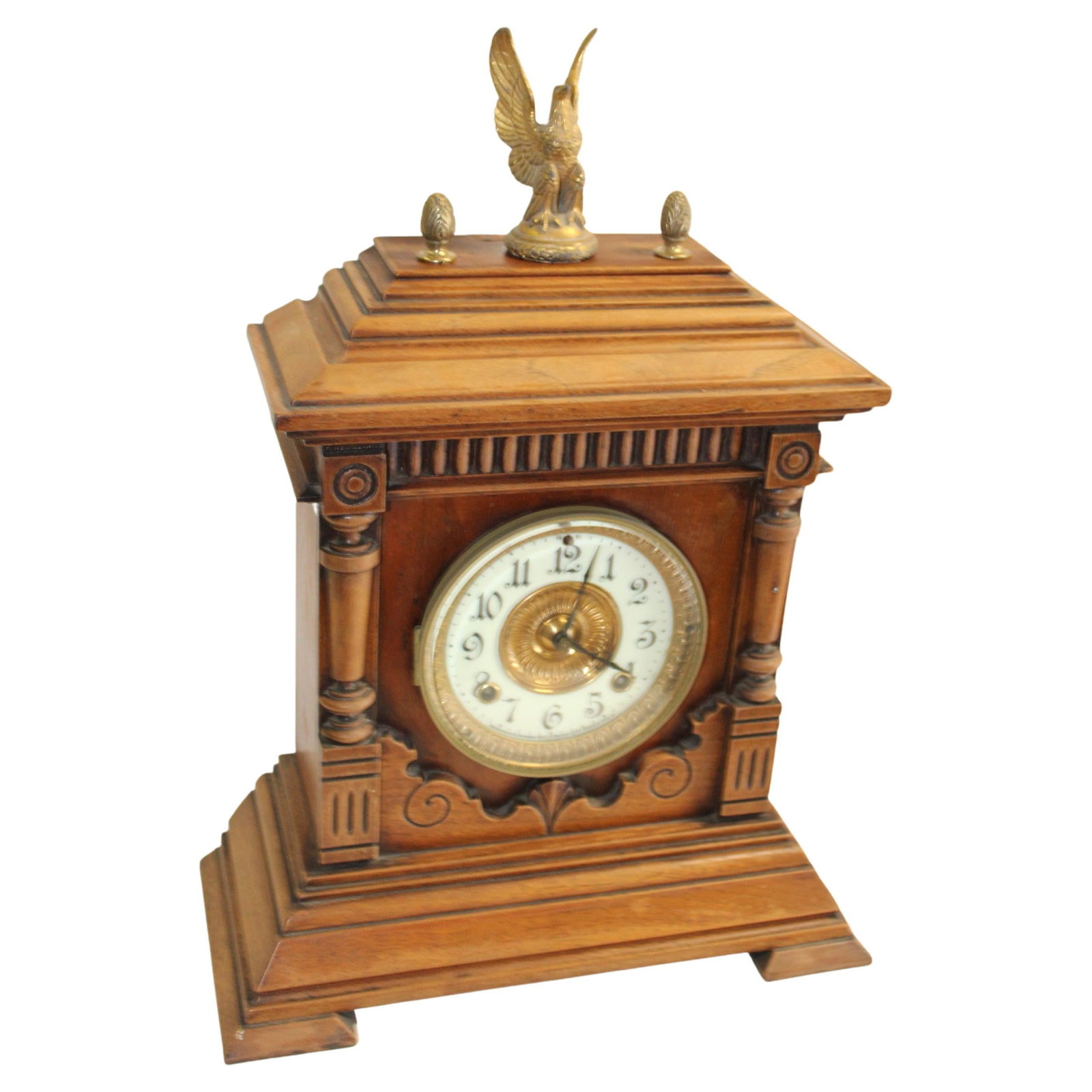 Antique Clock Ansonia Oak Case w Eagle: A good looking Clock. Mfg. in New York by Ansonia clock co. Shows label on back. 8 Day striker . Movement is marked as well and date 1878 ! Clock has an American Brass Eagle on top. Dial is in great