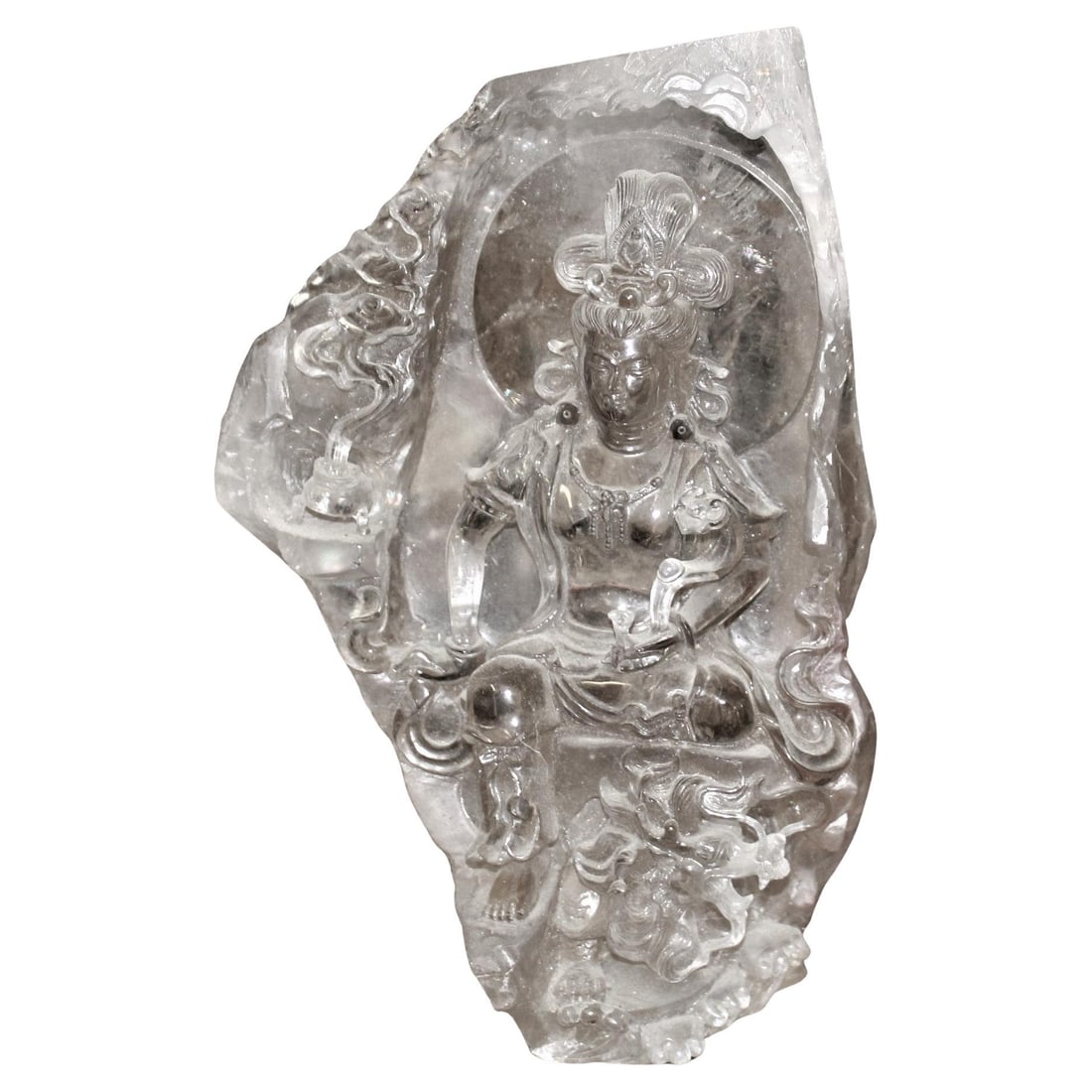 Quartz Rock Crystal of a Chinese Goddess: This is a very rare Carving of a Goddess seated inside of a large Quartz Rock Crystal . Hard to see any details in the photos . No signature found . The stone is appox 9" across and 12" in height .