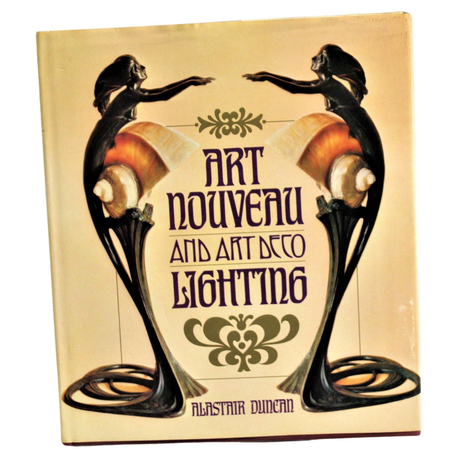 Art Nouveau & Art Deco Lighting by Alister Duncan: Collectors reference book showing many Art Deco and Art Nouveau lamps from the period. In good condition. Private art dealers collection. Reserve: $80.00 Shipping:Domestic: Flat-rate of $75.00 to