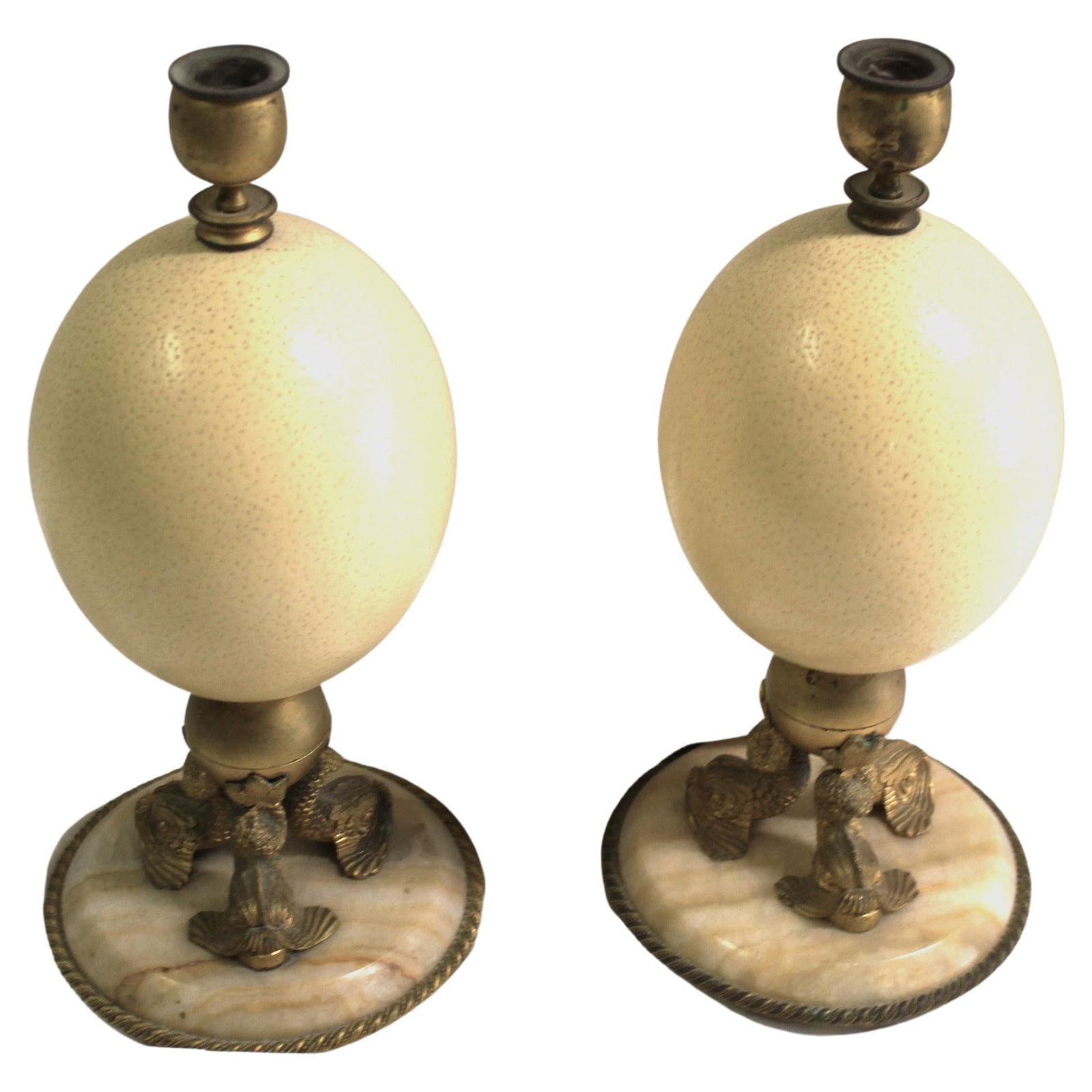 Late Empire Trippel Dolphin and Ostrich Candle Sticks: Very good looking Candle sticks, cast metal with Gold Dore' plated finish . The Dolphins are mounted on a 5 1/2" diameter marble base . The marble base has a twisted rope designed ring applied . No