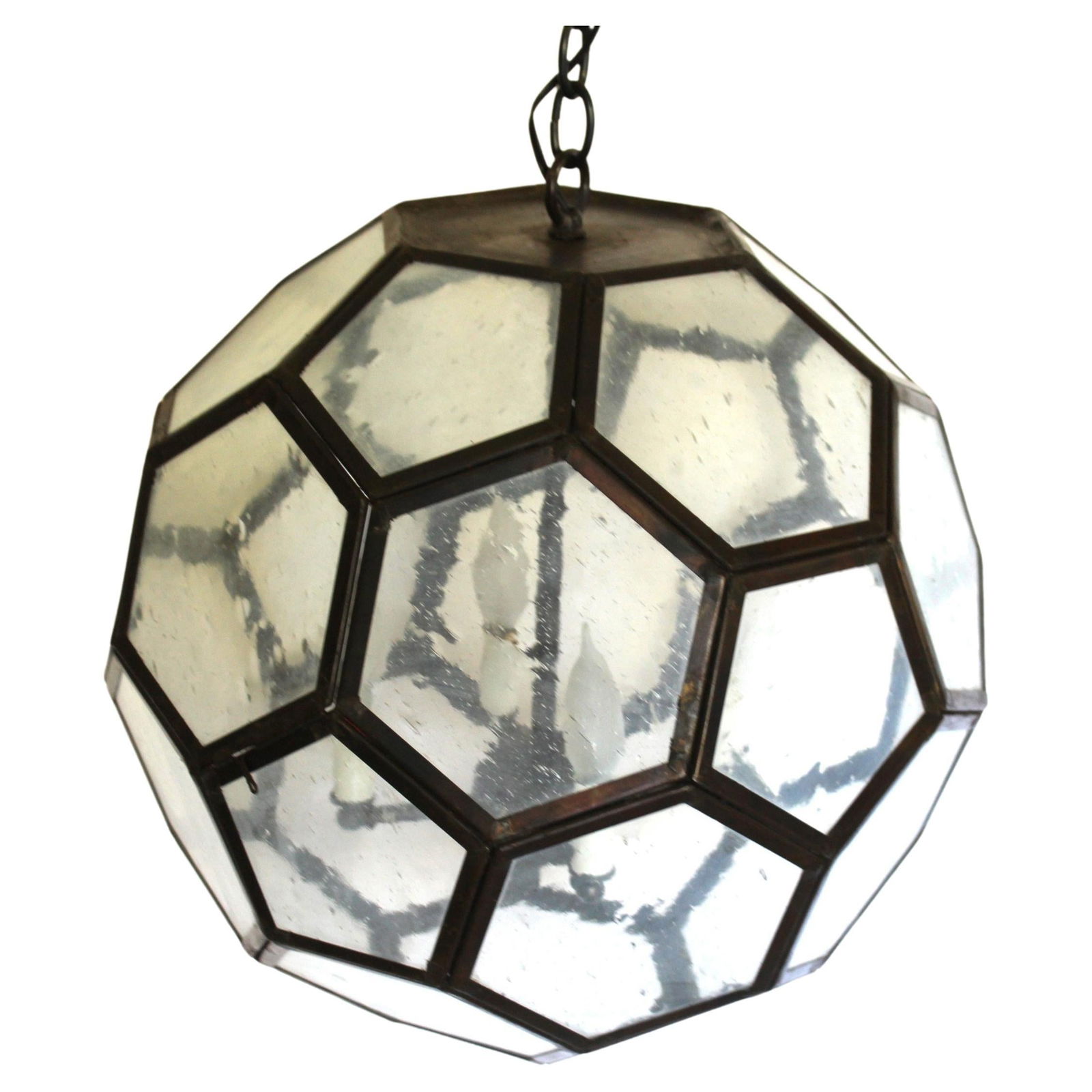 Mid Century Modern Soccer Ball Chandelier: Custom designed and Custom size of this Chandelier . Made of solid Brass banding all soldered together and with a darker Bronze acid finish . The glass windows are of (seedy Glass ) and diffuse the