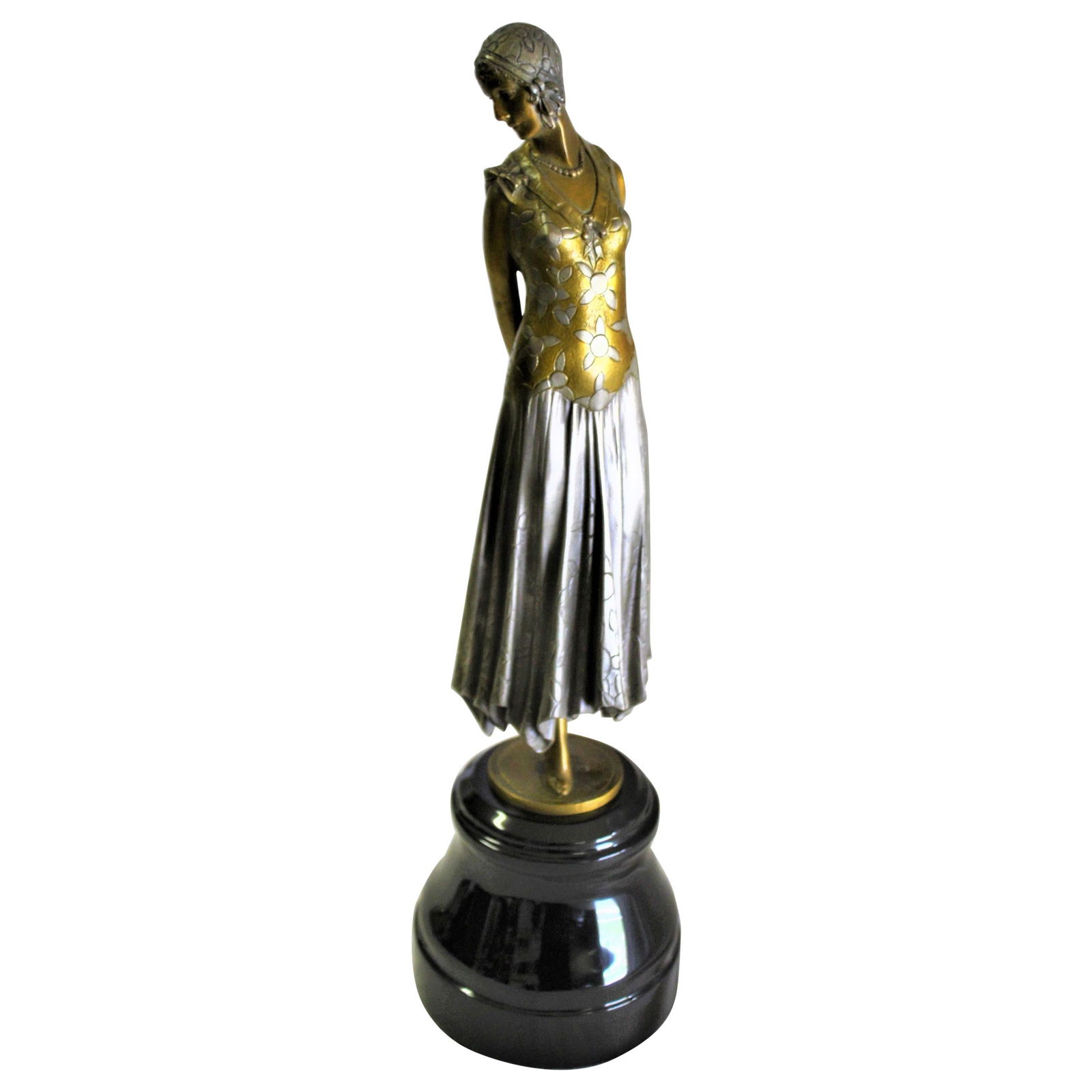 Art Deco Sculpture, Lady the Book Lady Bronze and Marble: A highly detailed figurine in multi-patina finishes. Mounted on a solid absolute black marble base. Made after the design of Chiparus circa 1990,s . From a private collection of hi-quality art deco