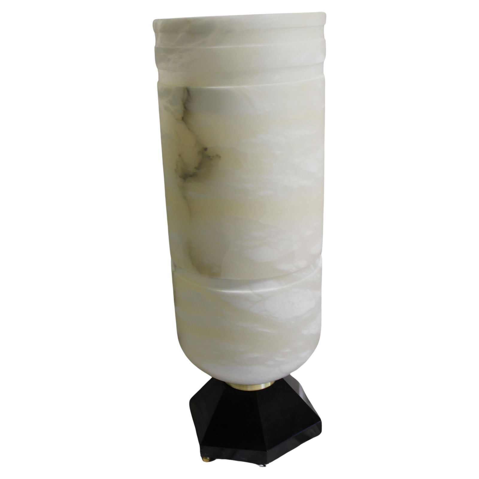 Art Deco/Modern Alabaster Up-Light Lumiere: Custom made from the design by Ruhlmann of the 20,s . Alabaster is made in Spain in that shape . Custom made absolute Black marble base at 10 1/2" across and 5" ht with solid brass ball feet . They