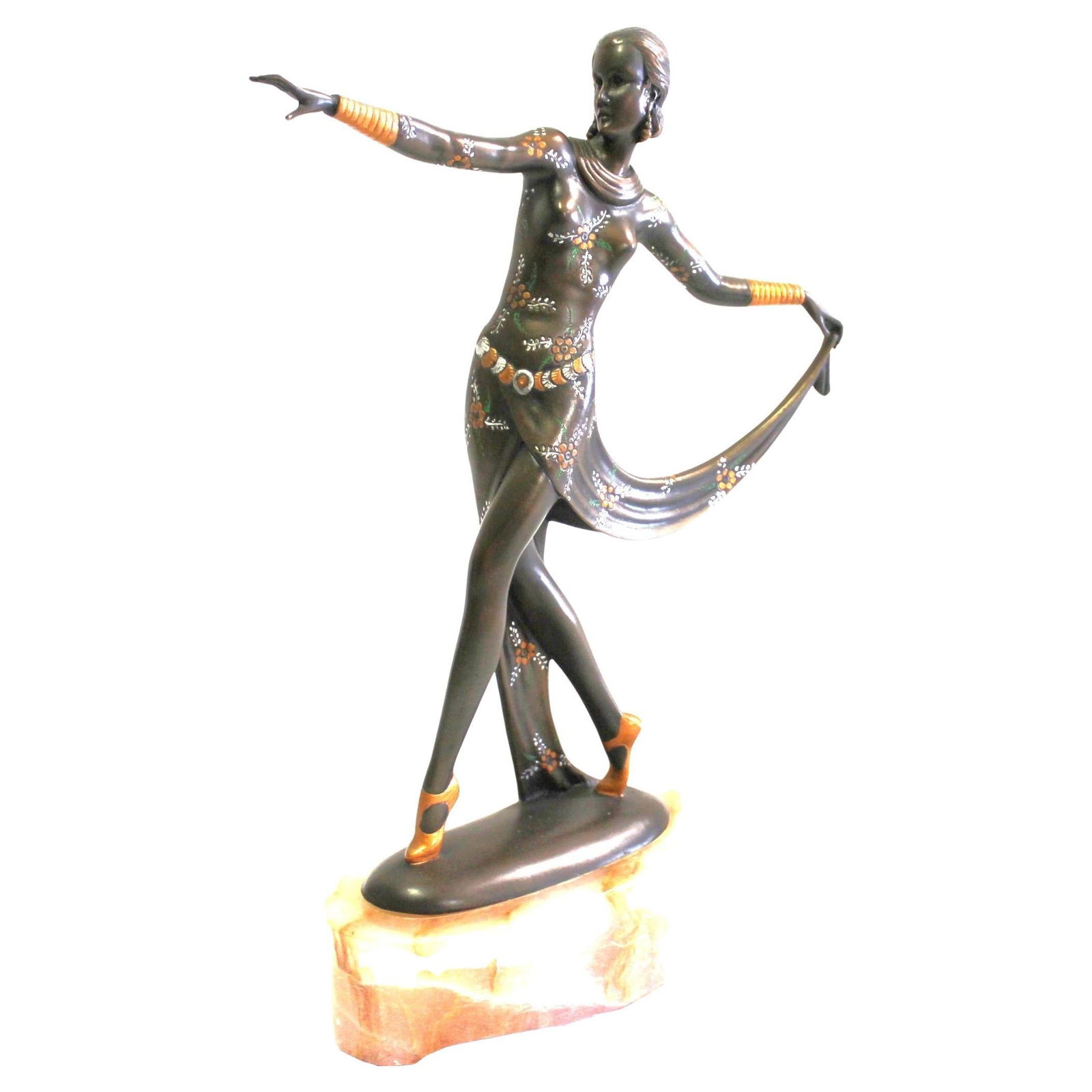 Art Deco Bronze , Dancer , England After Lorenzl: A Mid-Century /deco style Bronze Casting of a deco dancer holding her skirt up in hi-details with hand finished . She is standing on an Oval stone base also from England . There is artist marked on
