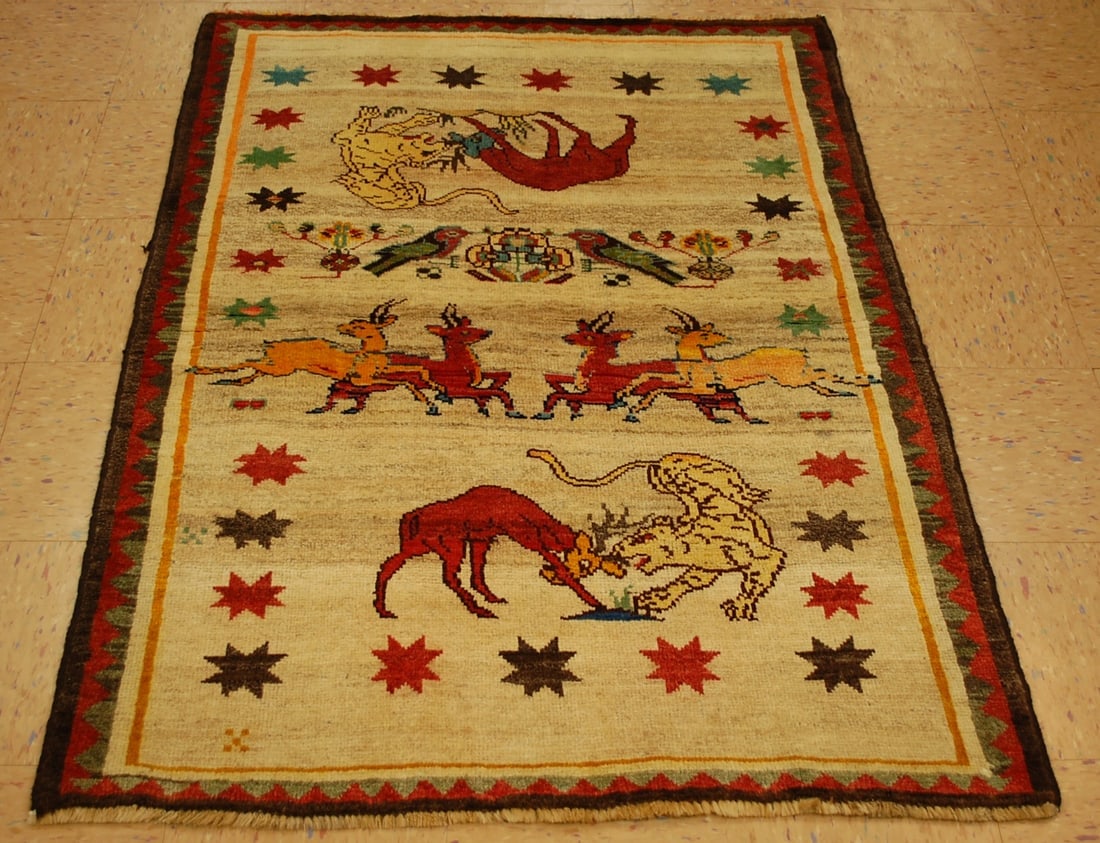PERSIAN SHIRAZ RUG 3.9x5: Title: PERSIAN SHIRAZ RUG 3.9x5 Description:OLD, ANTIQUE ANIMAL SUBJECTS AUTHENTIC AUTHENTIC HAND KNOTTED Persian QASHKI SHIRAZ RUG with exact size of 3' 9" x 5' natural dyed wool woven on wool founda