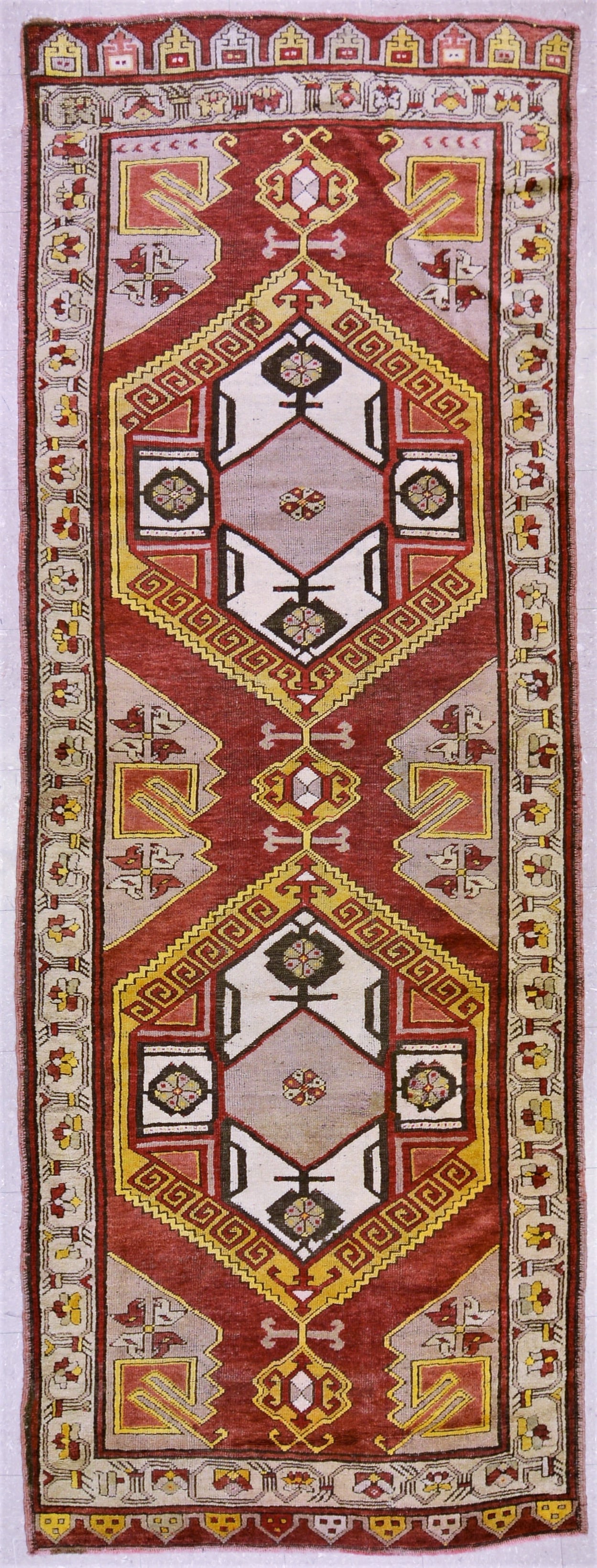 HAND KNOTTED WOOL OUSHAK RUG: Title: HAND KNOTTED WOOL OUSHAK RUGDimensions: 4X10'9Age: VINTAGEOrigin: TURKISH Reserve: $2,500.00 Shipping:Domestic: Shipping rates are determined by destinationInternational: Foreign shipping